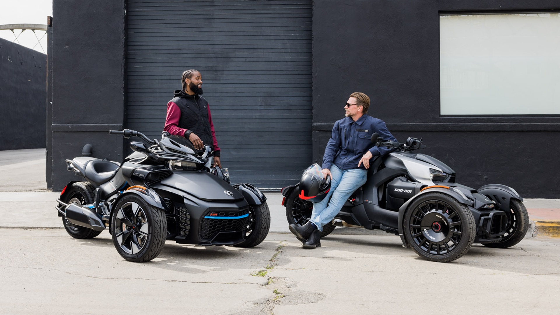 Riders with their Can-Am rides speaking