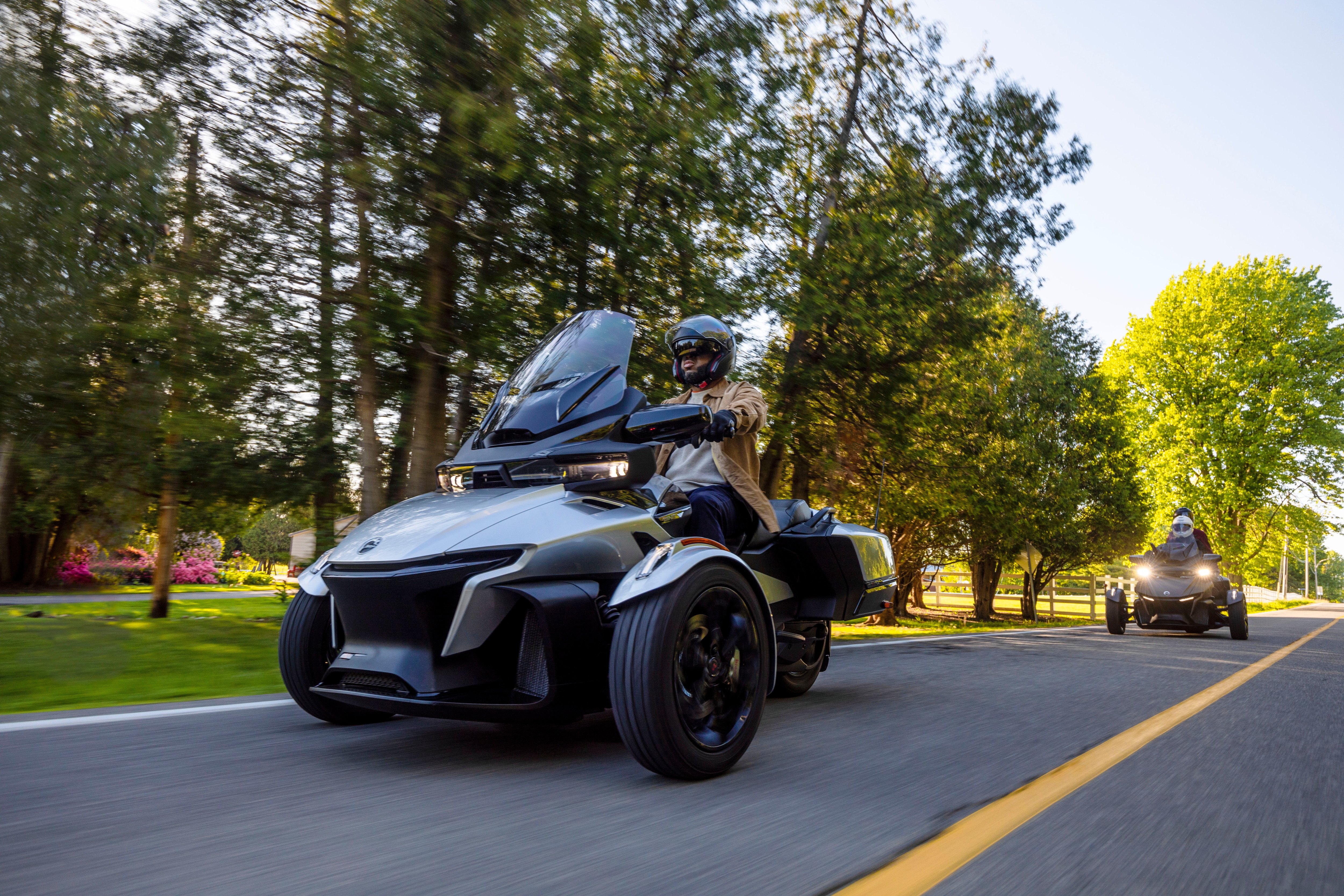 A man driving his Can-Am Spyder RT designed for sport touring