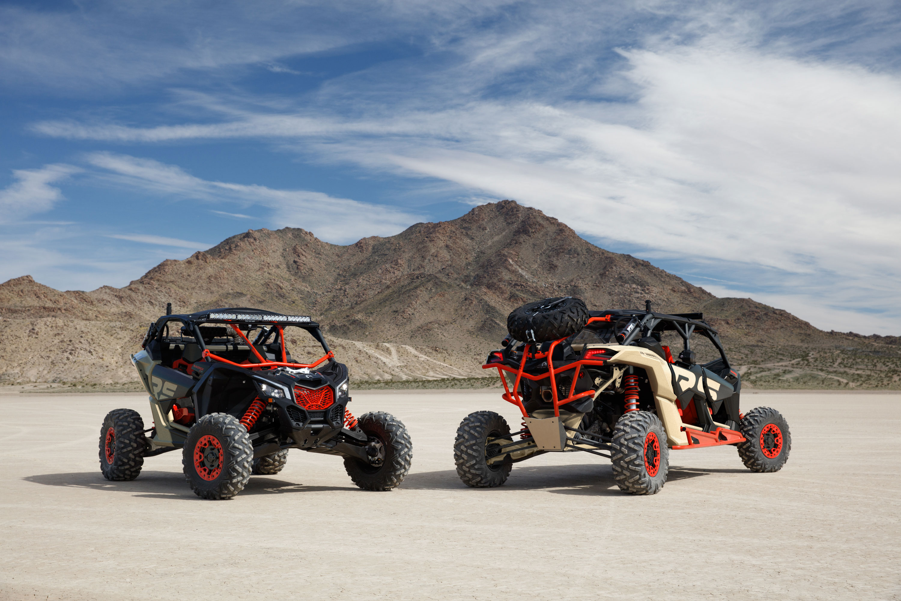 A Can-Am Maverick side-by-side going full speed in the desert