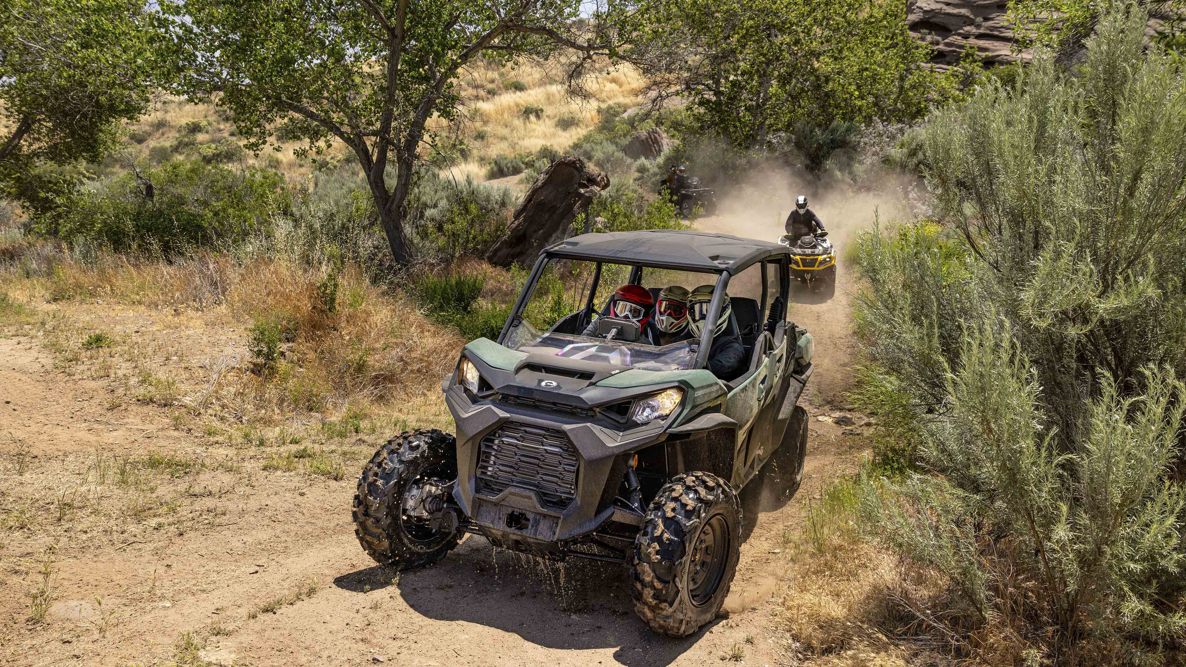 Tread Lightly riding Can-Am off-road vehicles on their way to maintain another area