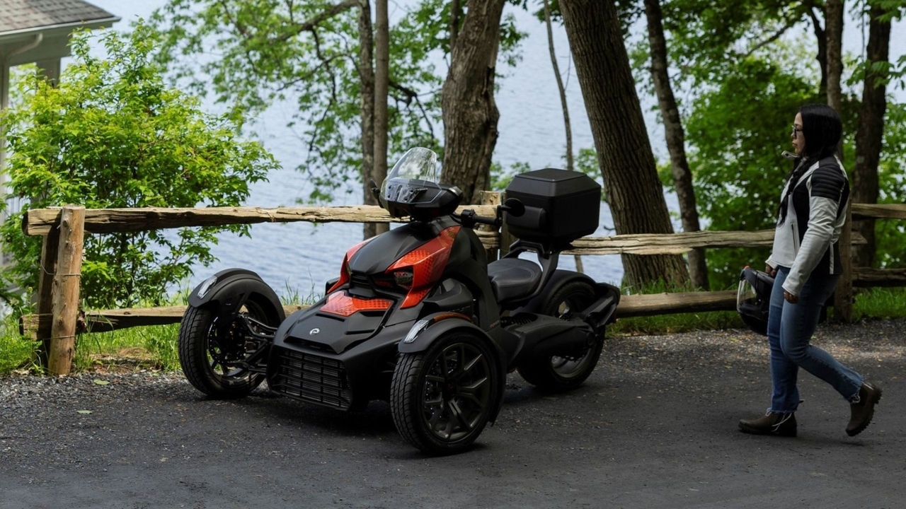 Woman with her 2026 Can-Am Ryker 3-wheel motorcycle fully customised