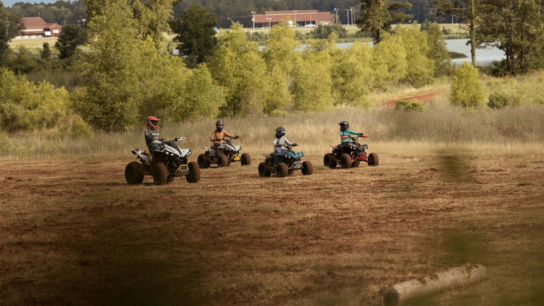 Four Can-Am kid quads through the trees