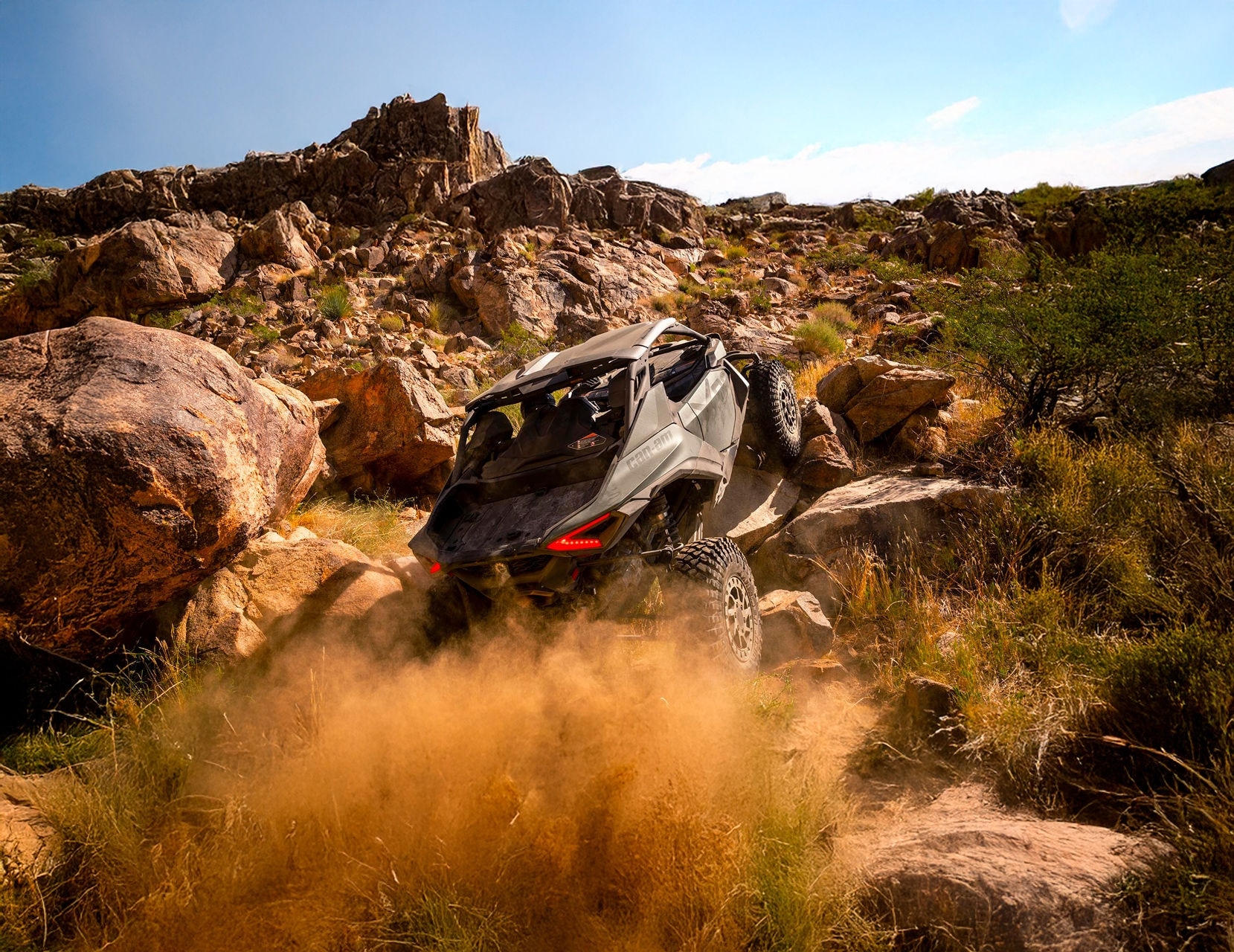 2026 Can-Am Maverick R X rc side-by-side doing rock crawling