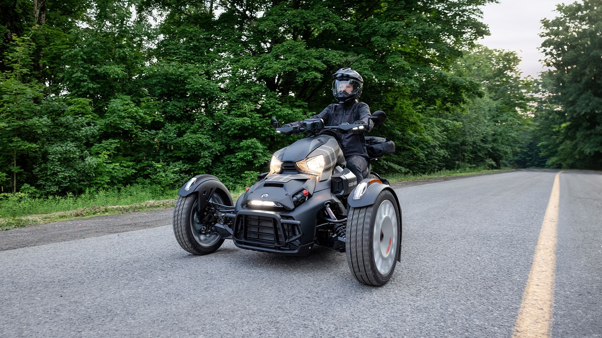A driver testing a Can-Am Ryker