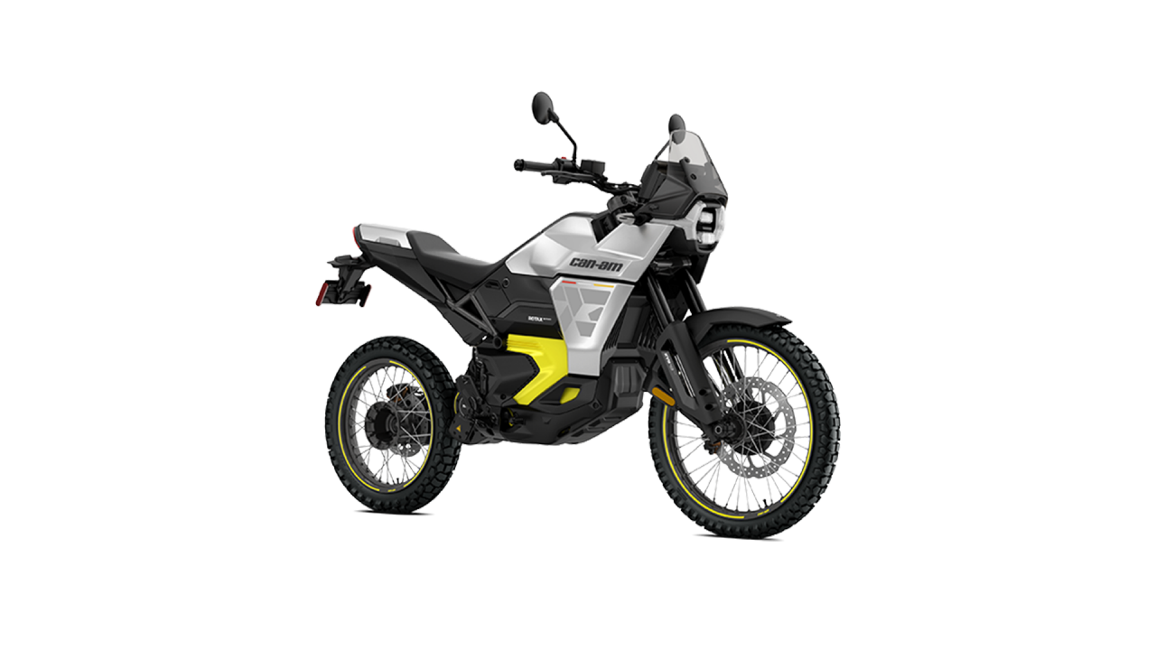 Rider sitting on a Can-Am Spyder 3-Wheel and looking behind