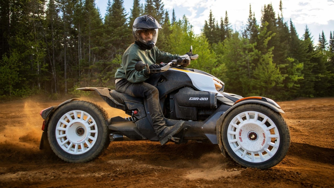 Person riding a Can-Am Ryker Rally in the dirt
