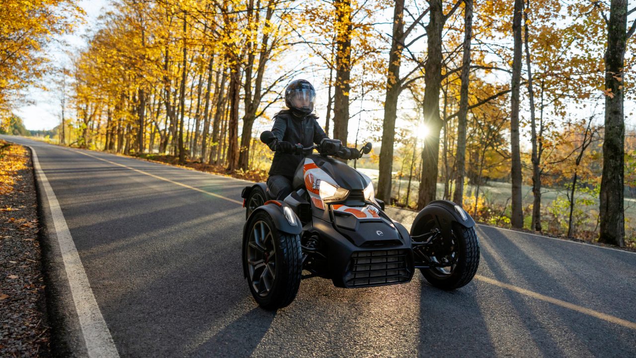 Can-Am Ryker rider cruising the open road during fall