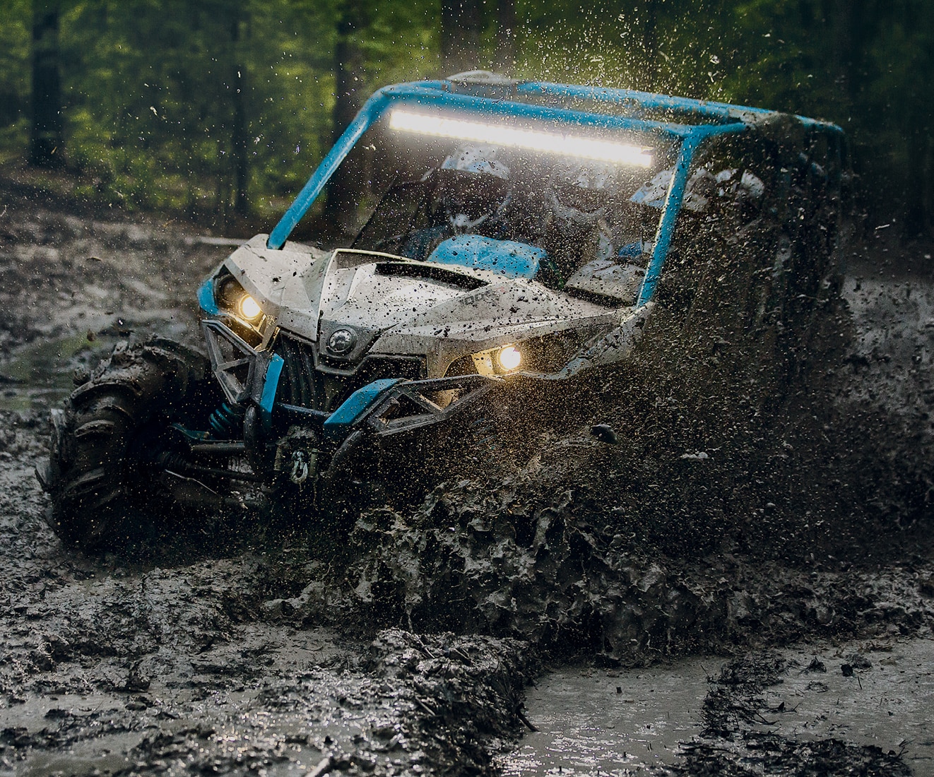 Can-Am vehicle on mud