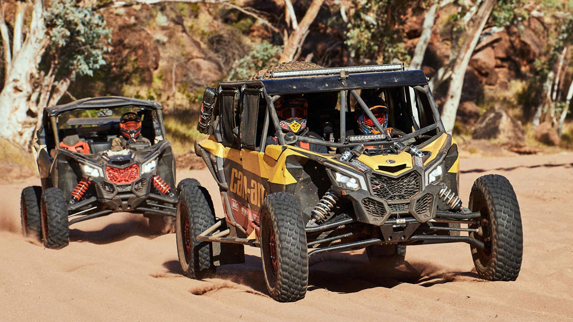 Two CAn-Am MAverick X3 following each others in the desert