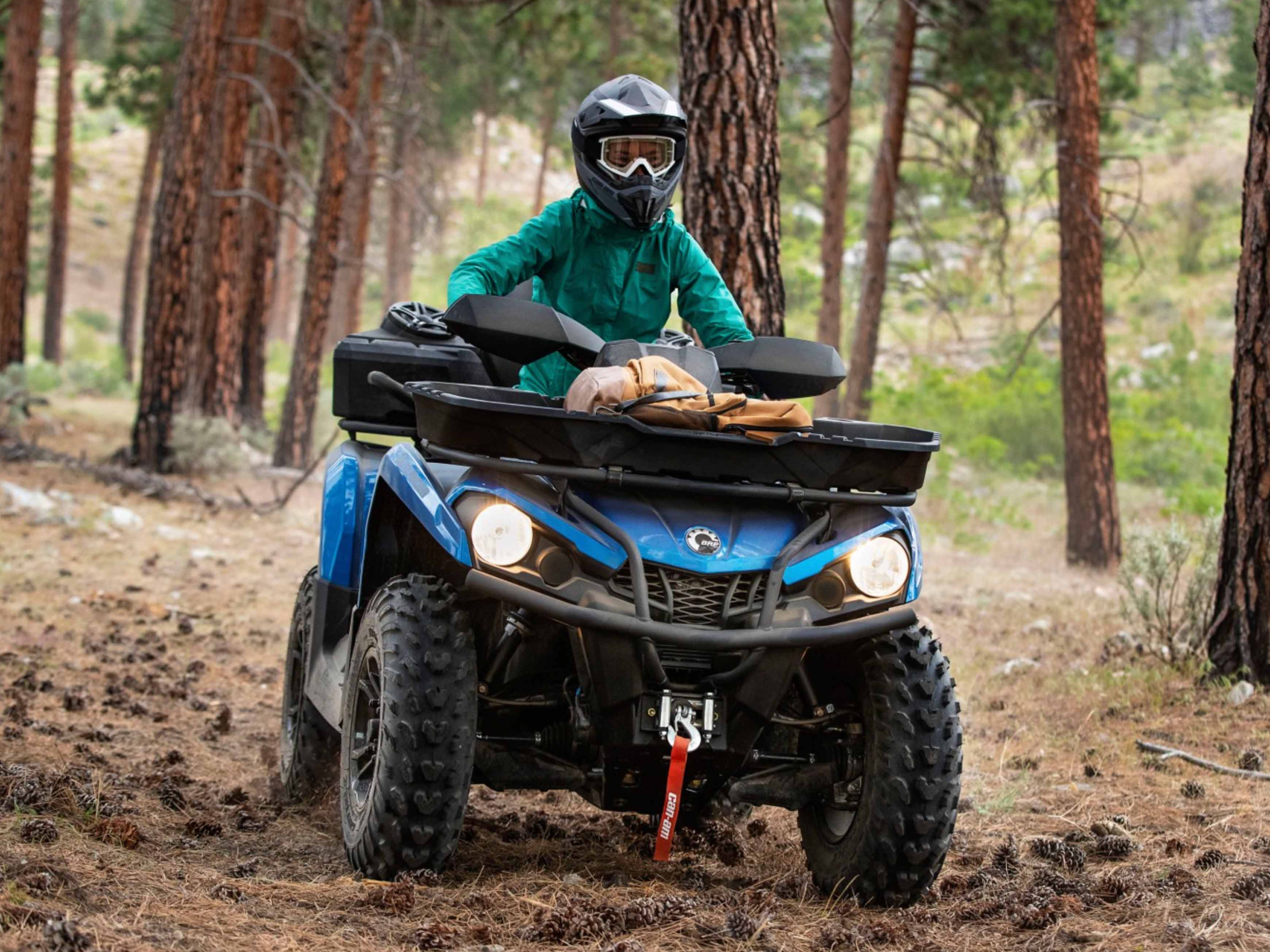 Outlander XT Riding in the Bush Front Angle