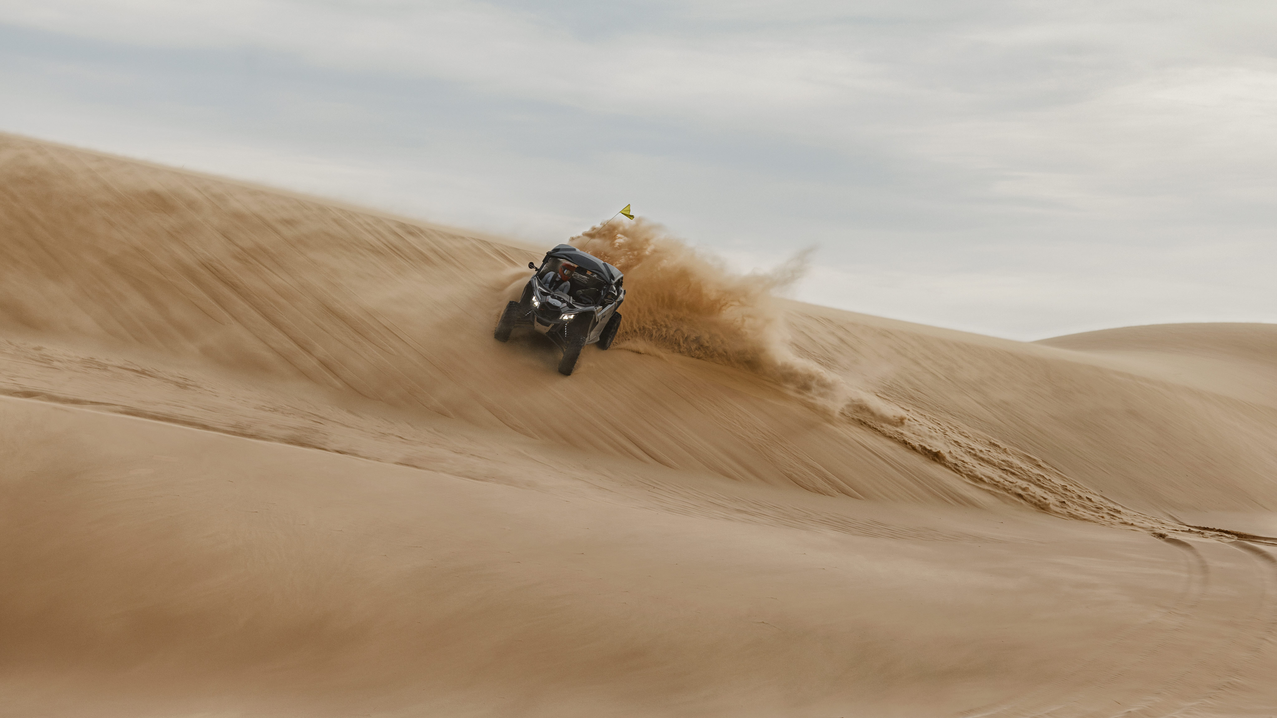 Maverick X3 X DS Turbo RR riding full speed in sand dunes