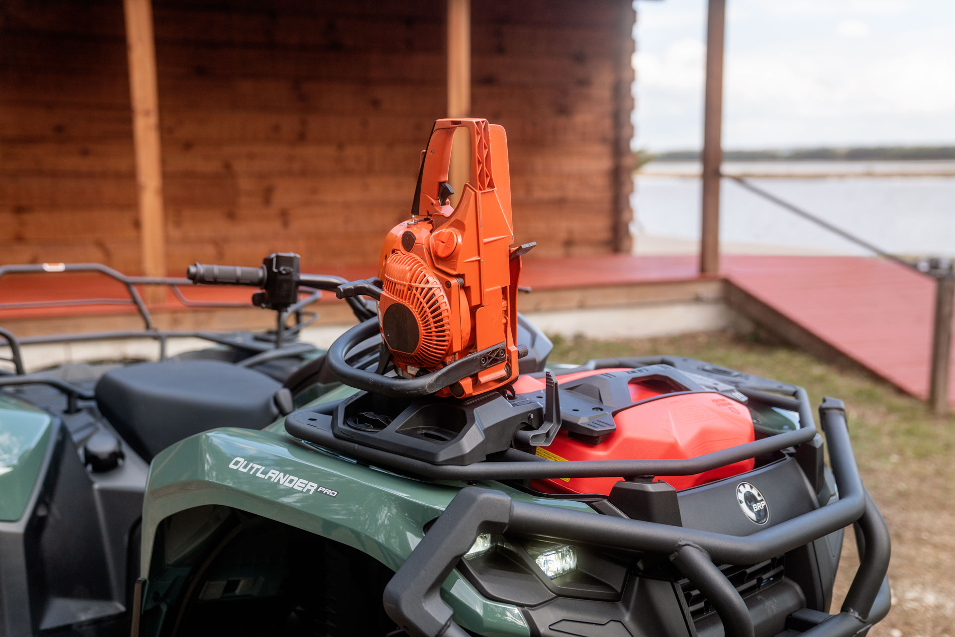 Can-Am Outlander Pro with chainsaw holder and LinQ fuel caddy