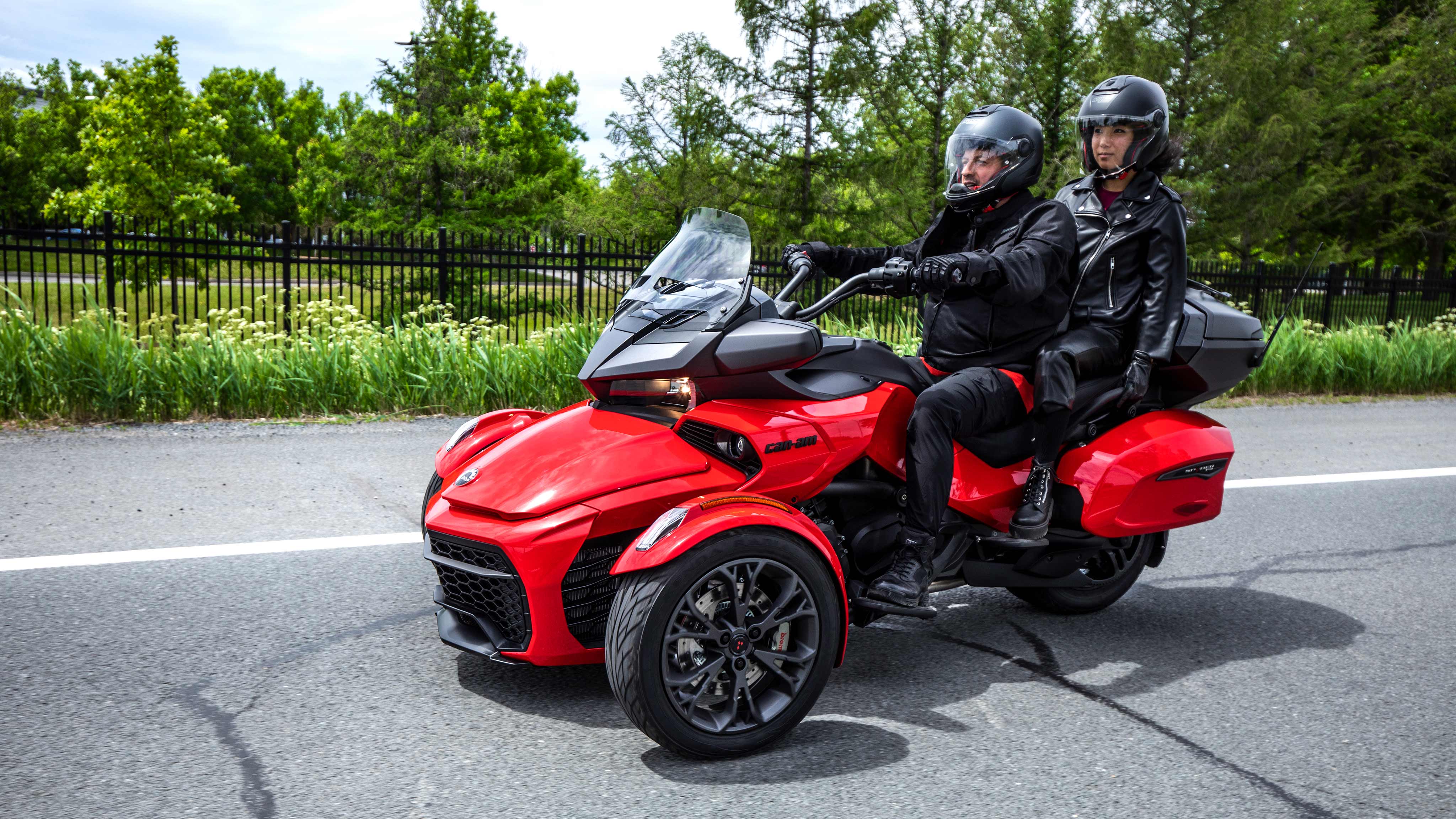 Man riding with passenger on Spyder F3 Limited