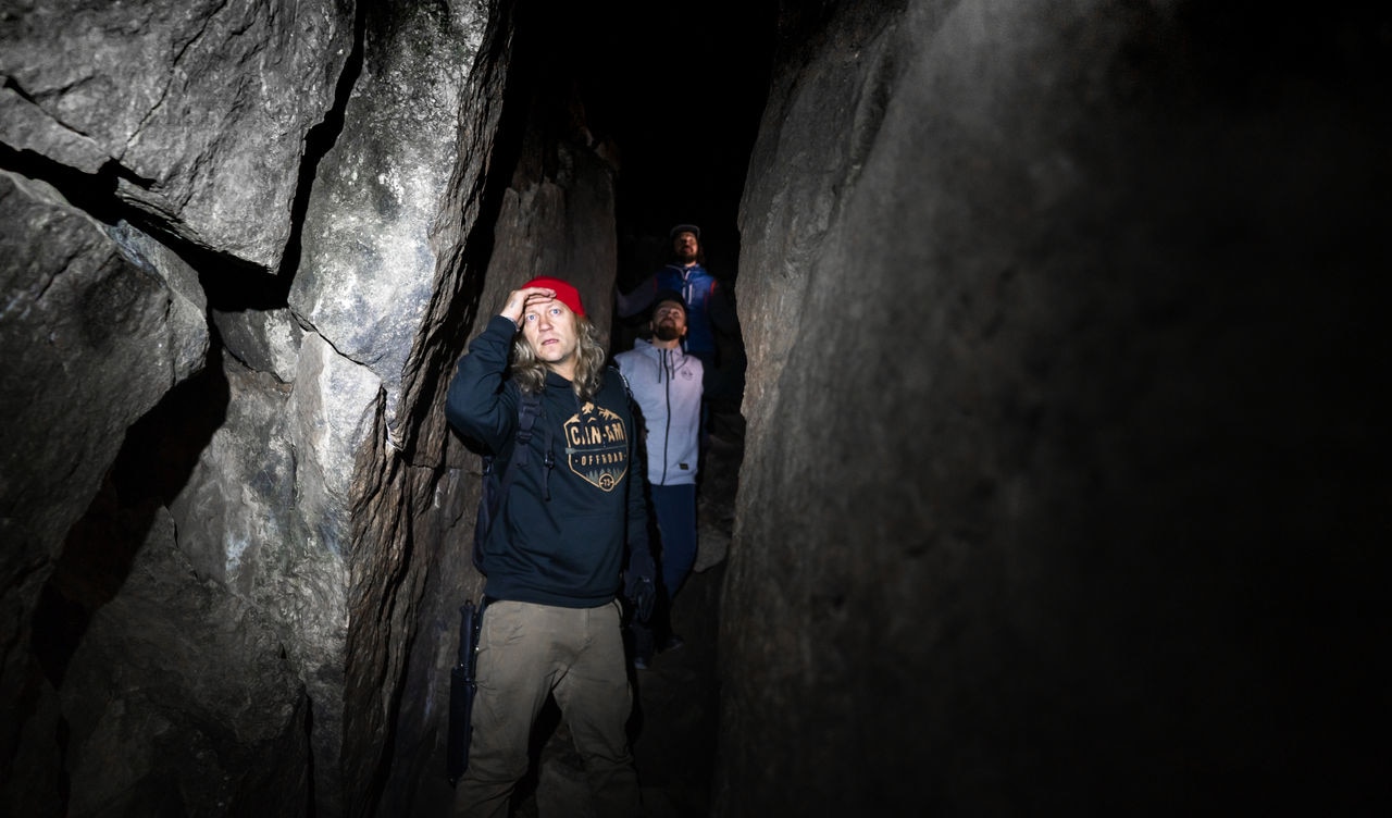 Jukka Hilden and Biisonimafia visiting a cave in Koli park