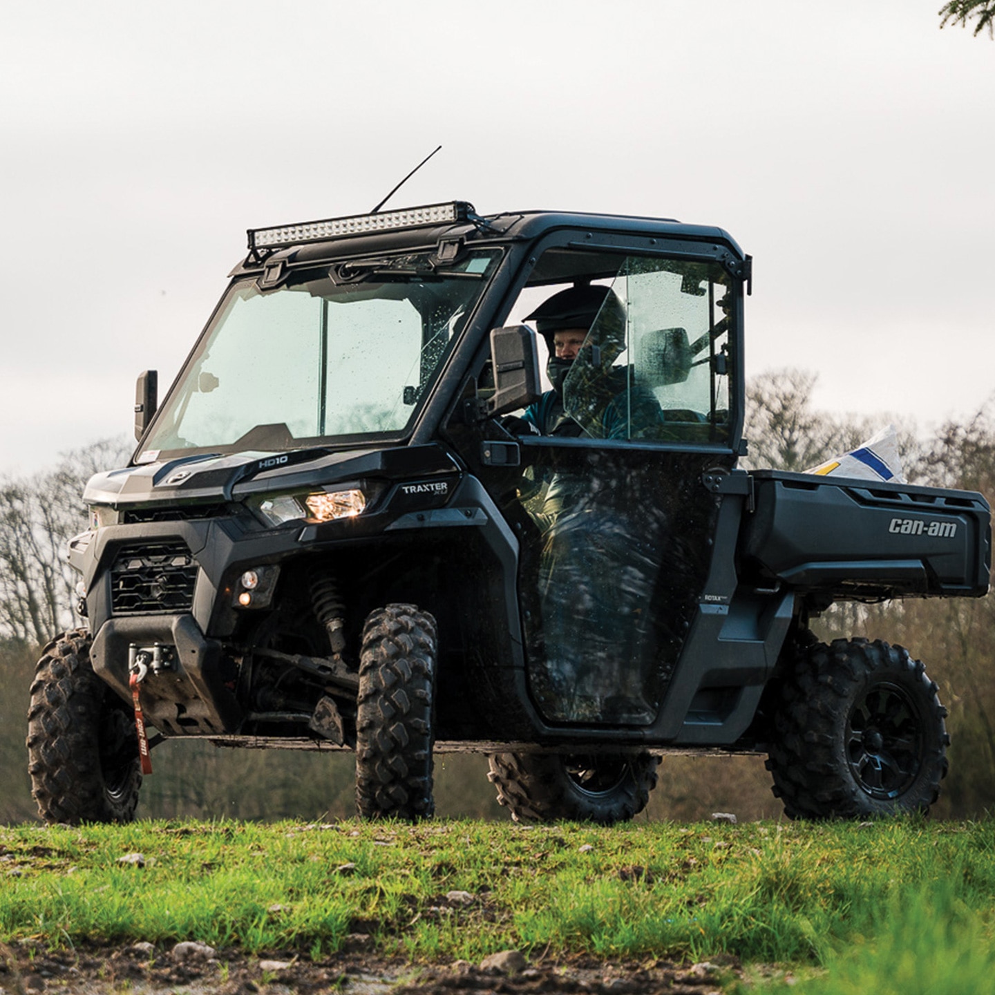 Traxter XU 2025 in action on a field