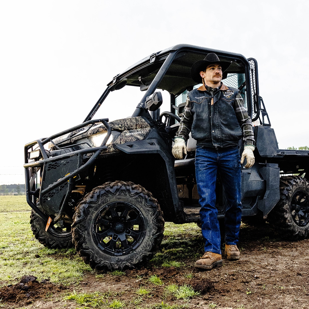 Bull riding champion Chase Outlaw with his Can-Am Defender