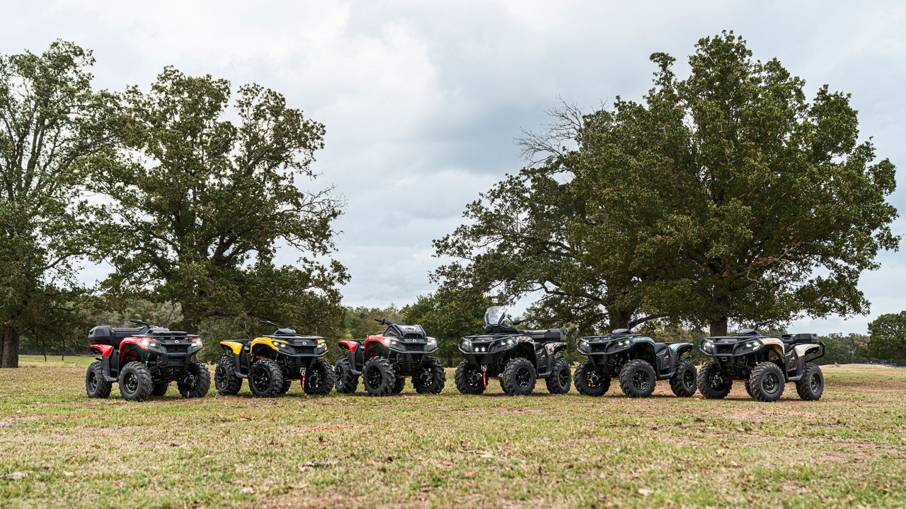 All Can-Am ATV models in a field