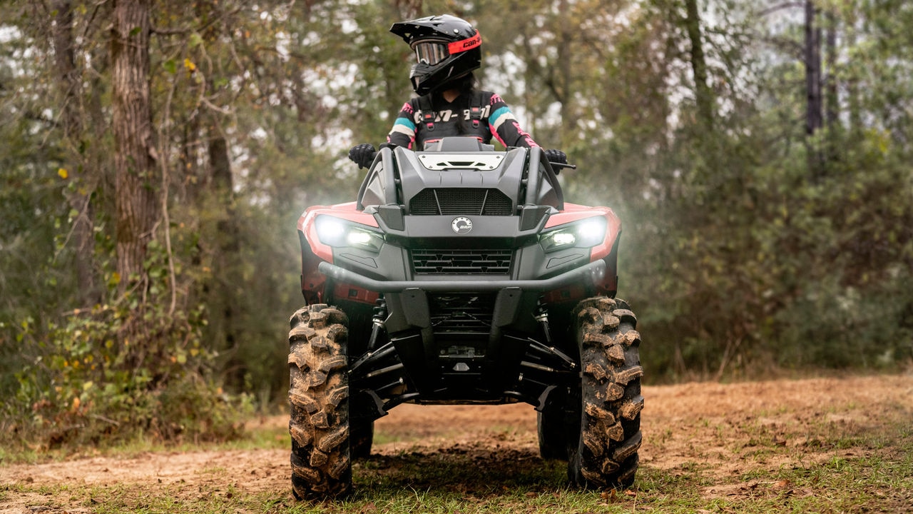 The driver of a 2023 Outlander X mr 700 Can-Am off-road in the forest