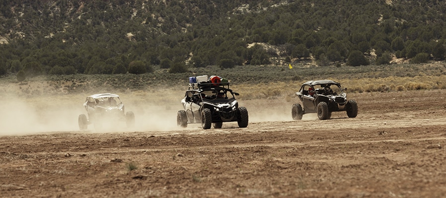 Can-Am Maverick X3 side by side racing in the desert.