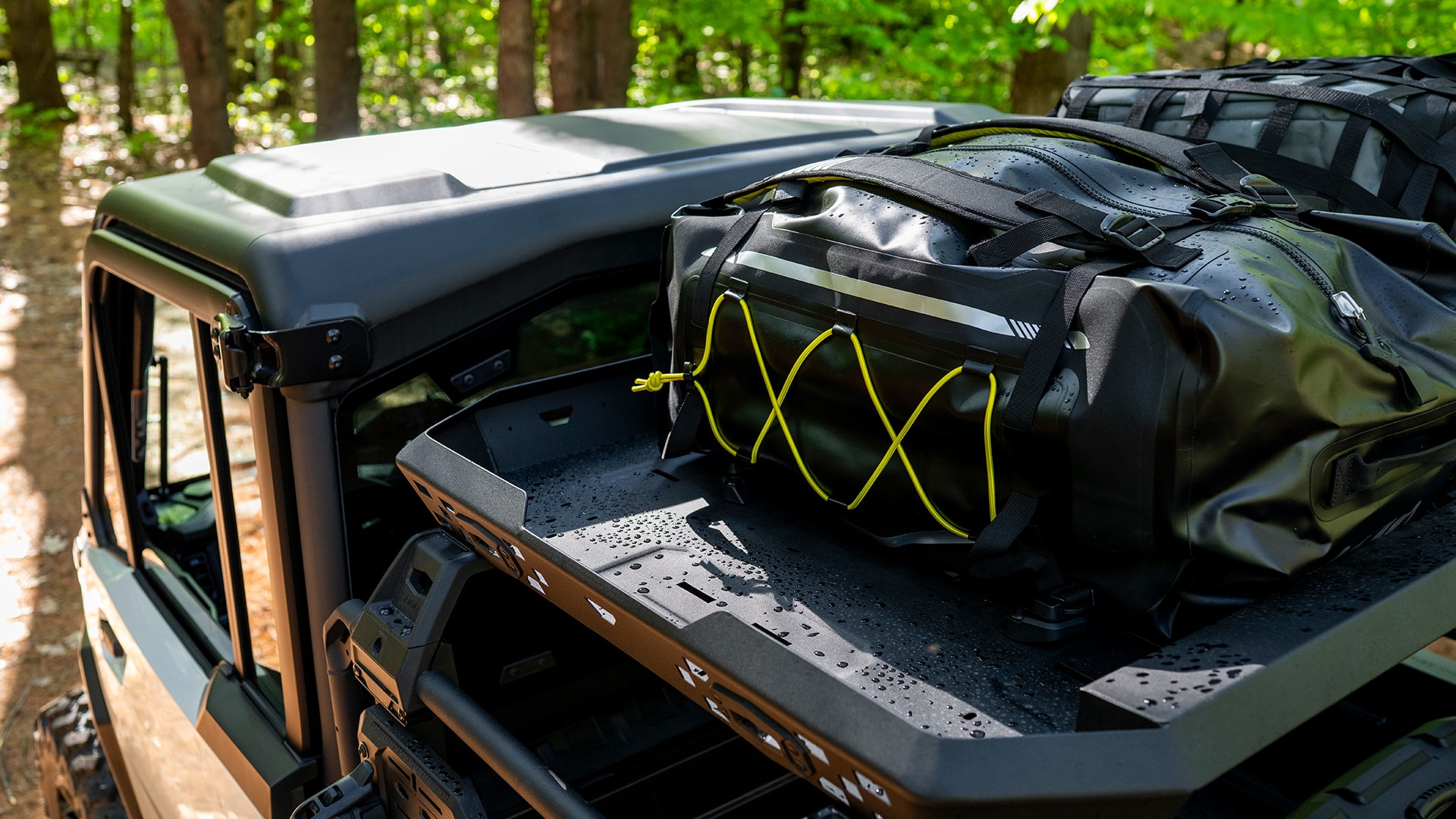 Storage bags placed on the roof of a 2026 Can-Am Defender HD11