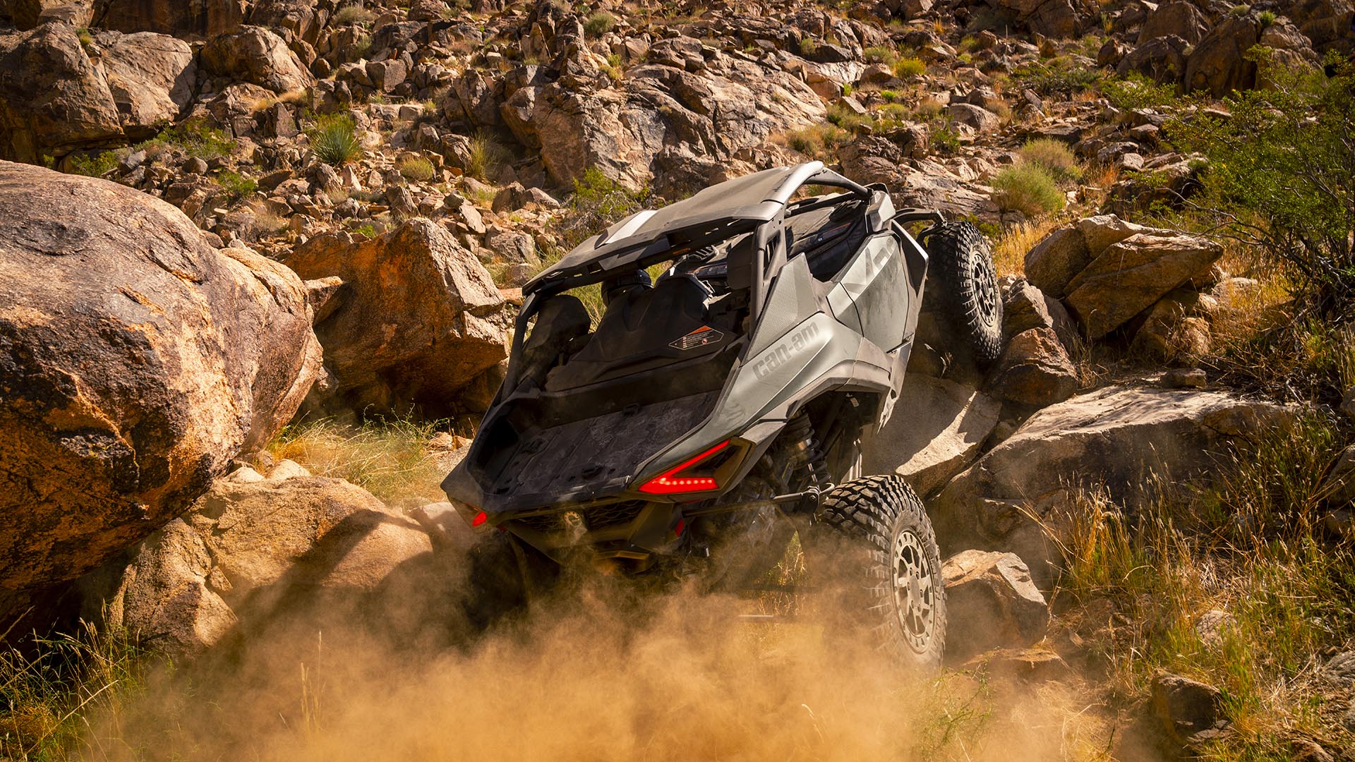 A 2026 Can-Am Maverick R X RC rock crawling