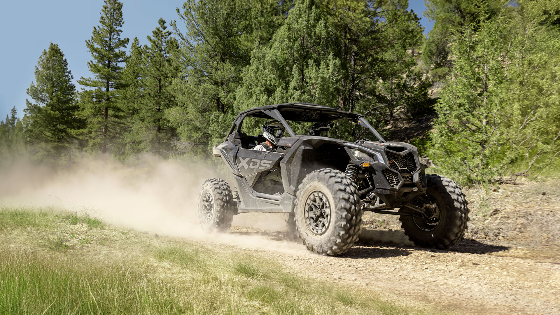 A Maverick X3 X DS SAS Turbo RR with reliable clutch and CVT on a dirt road 