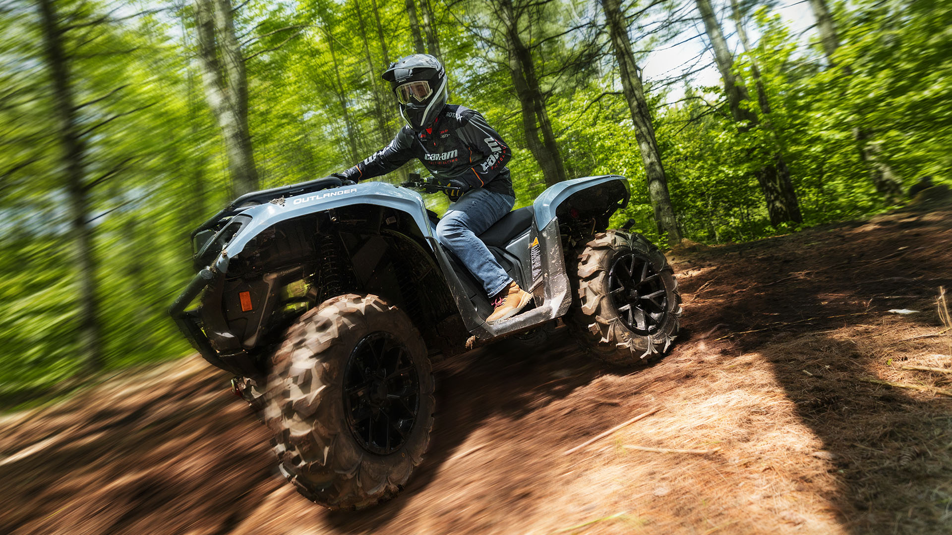 2026 Can-Am Outlander XT 700 Scandi Blue in the forest