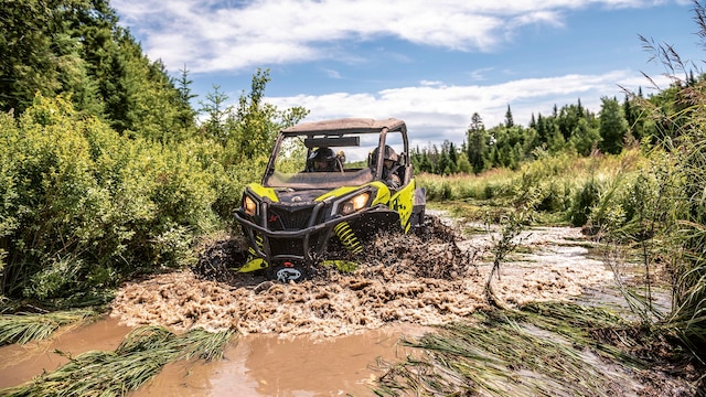 Can-Am Maverick Trail side-by-side in the mud