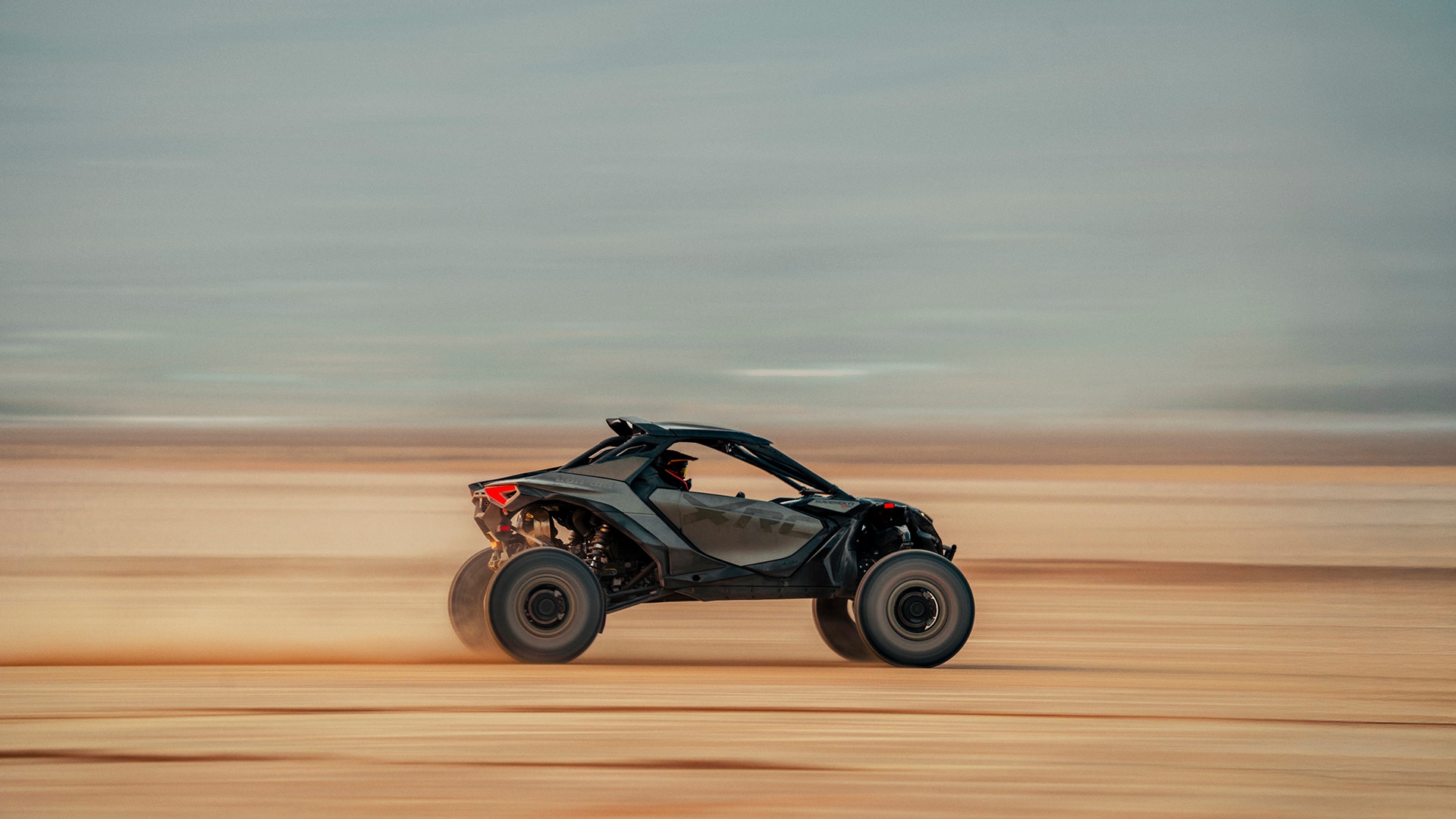A 2026 Can-Am Maverick X RC racing in the desert