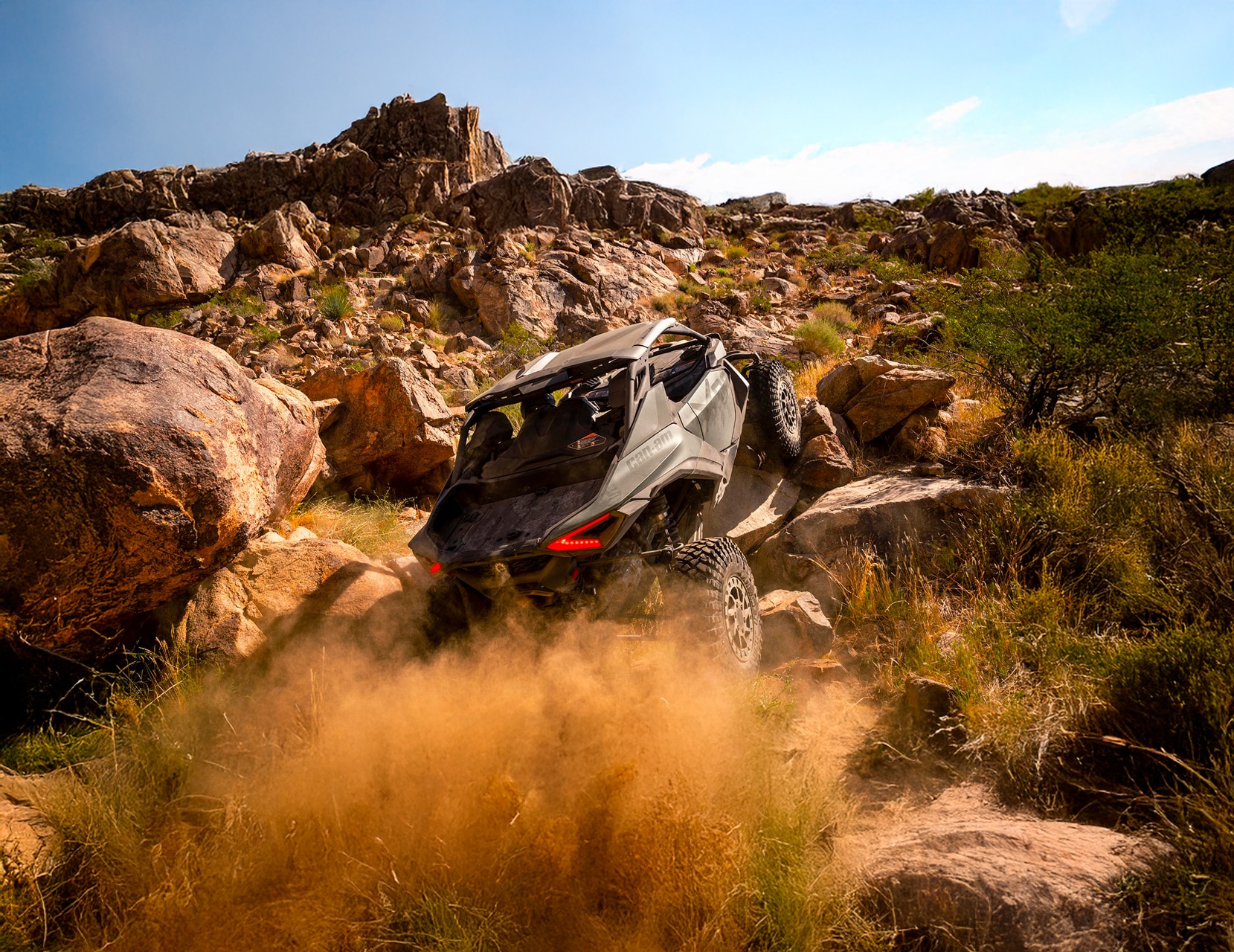 A 2026 Can-Am Maverick R X RC rock crawling