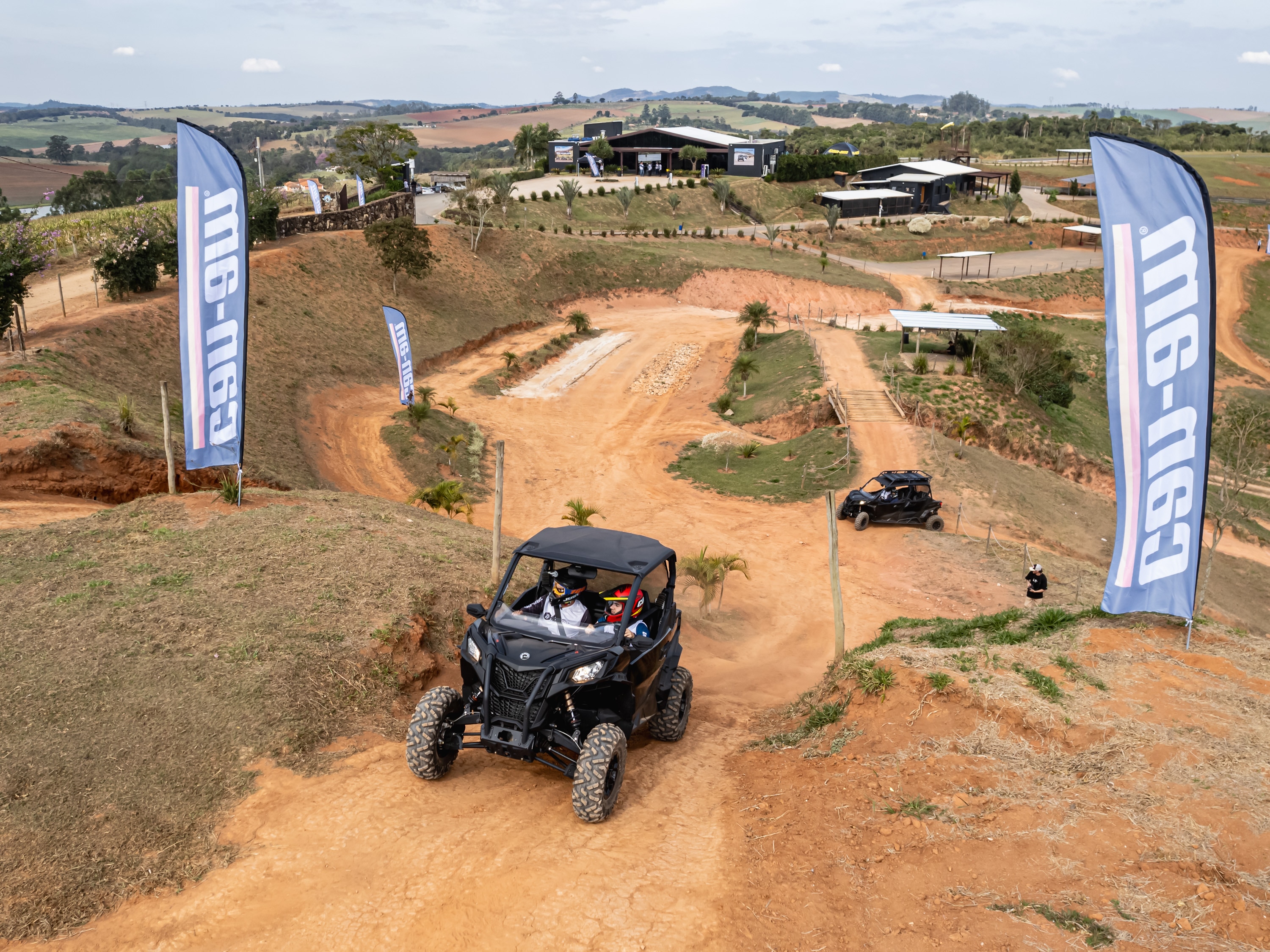 Maverick X3 rolling on dirt path 