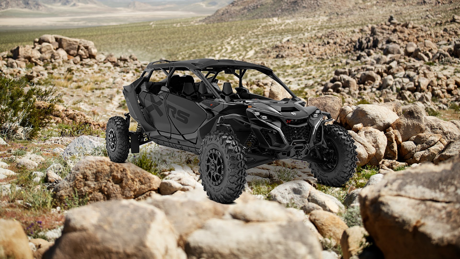 Modelo Maverick R MAX X rs 2026 entre rochas.