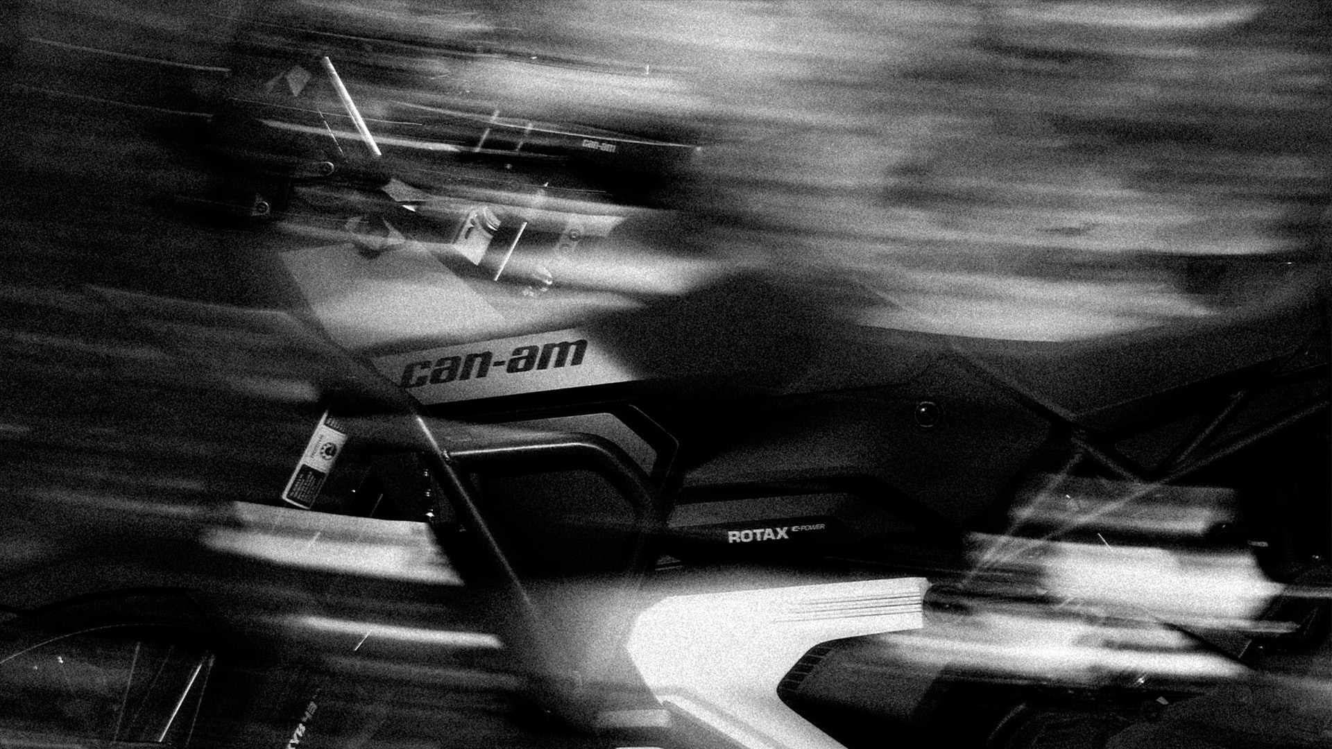 Rider on a Can-Am Origin electric motorcycle