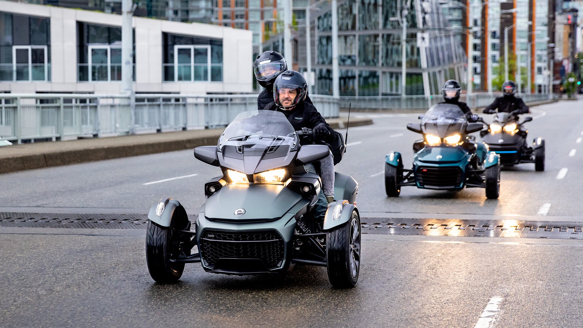 Three Can-Am On-Road Spyder F3 riding through the city