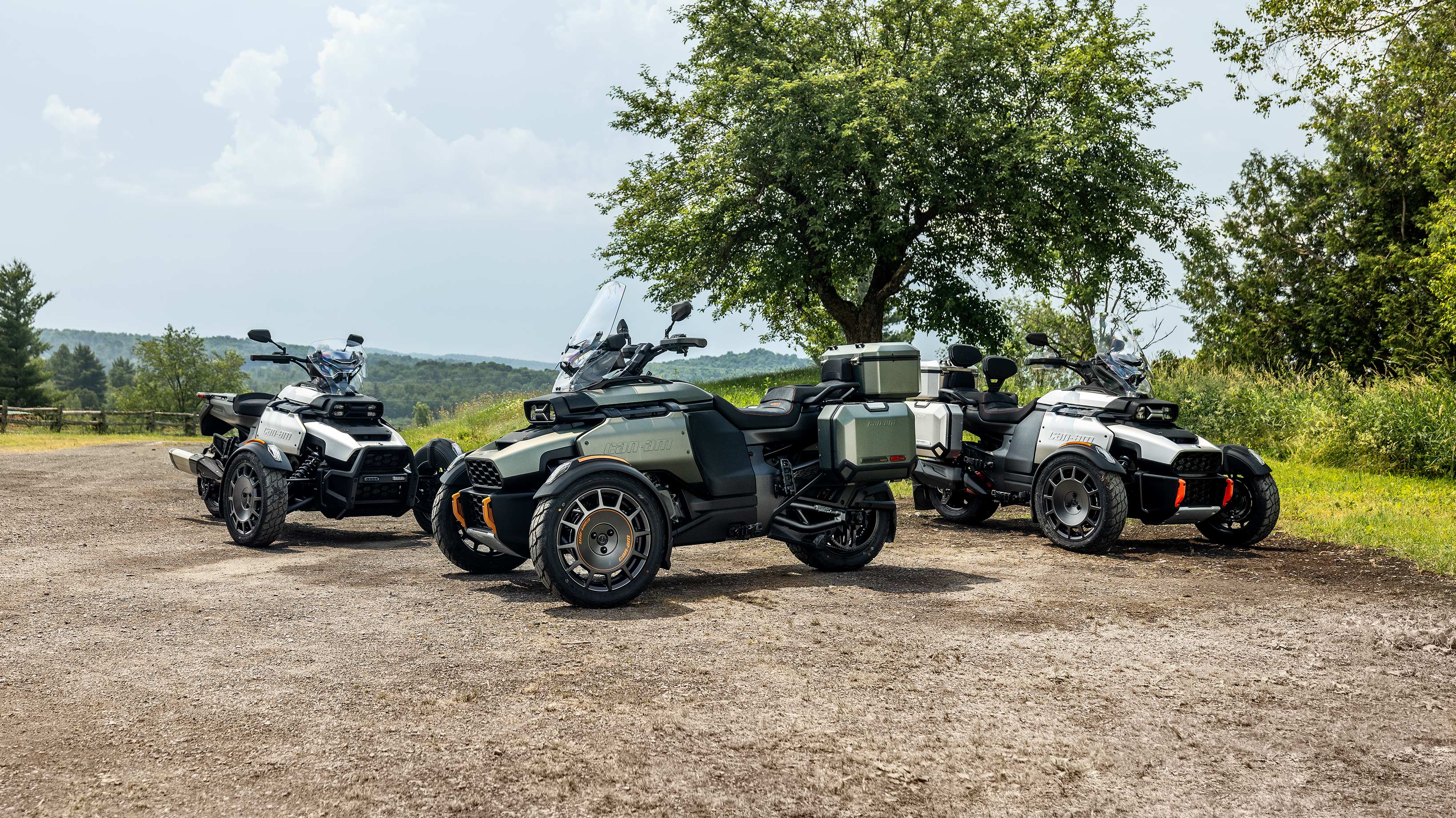 The 3 new Can-Am Canyon 3-wheel vehicles on a gravel road