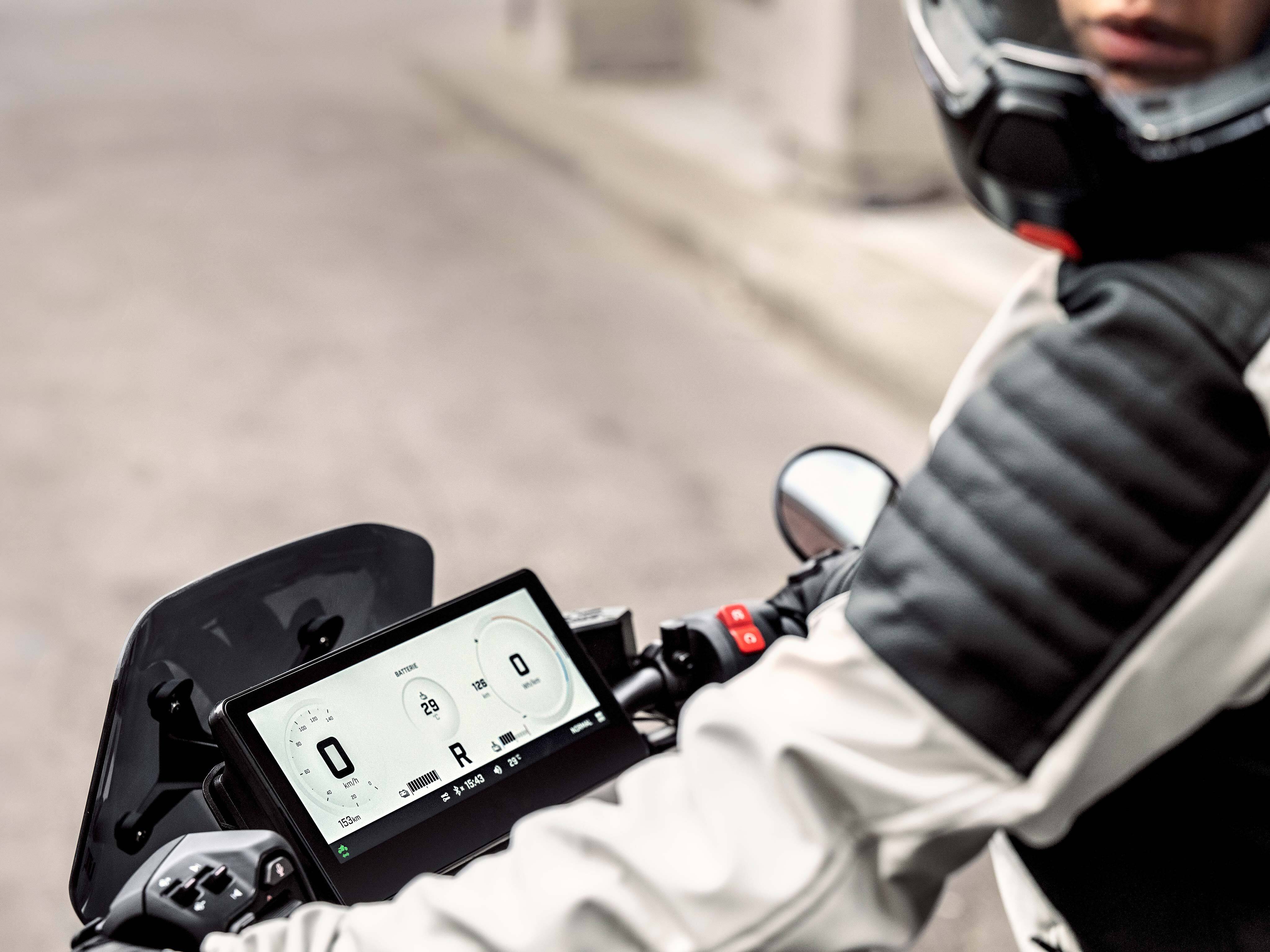 A rider using the reverse function on his Can-Am Pulse motorcycle