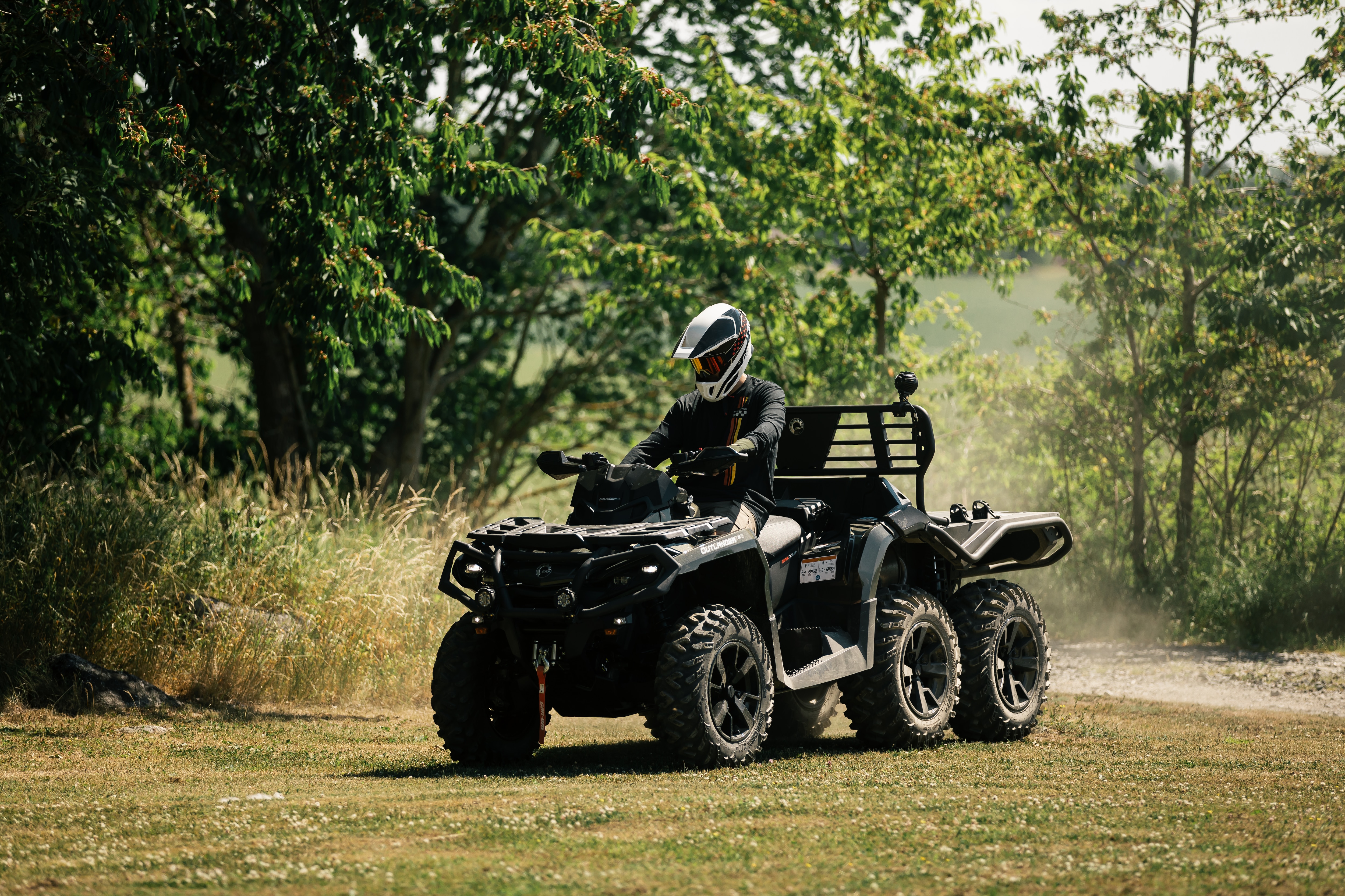 Joacim Rickling on an Outlander ATV