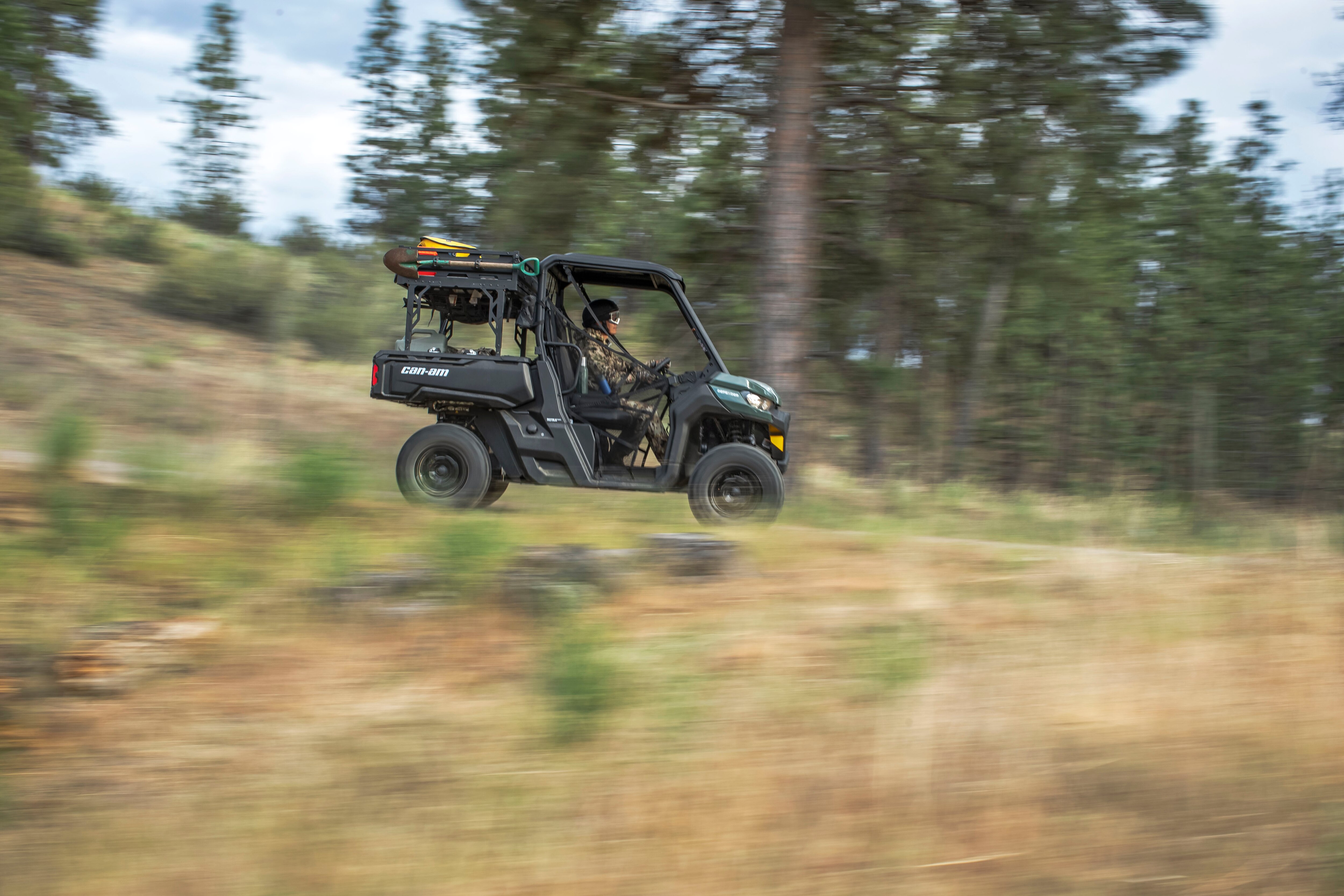 Can-Am Traxter in a forrest trail