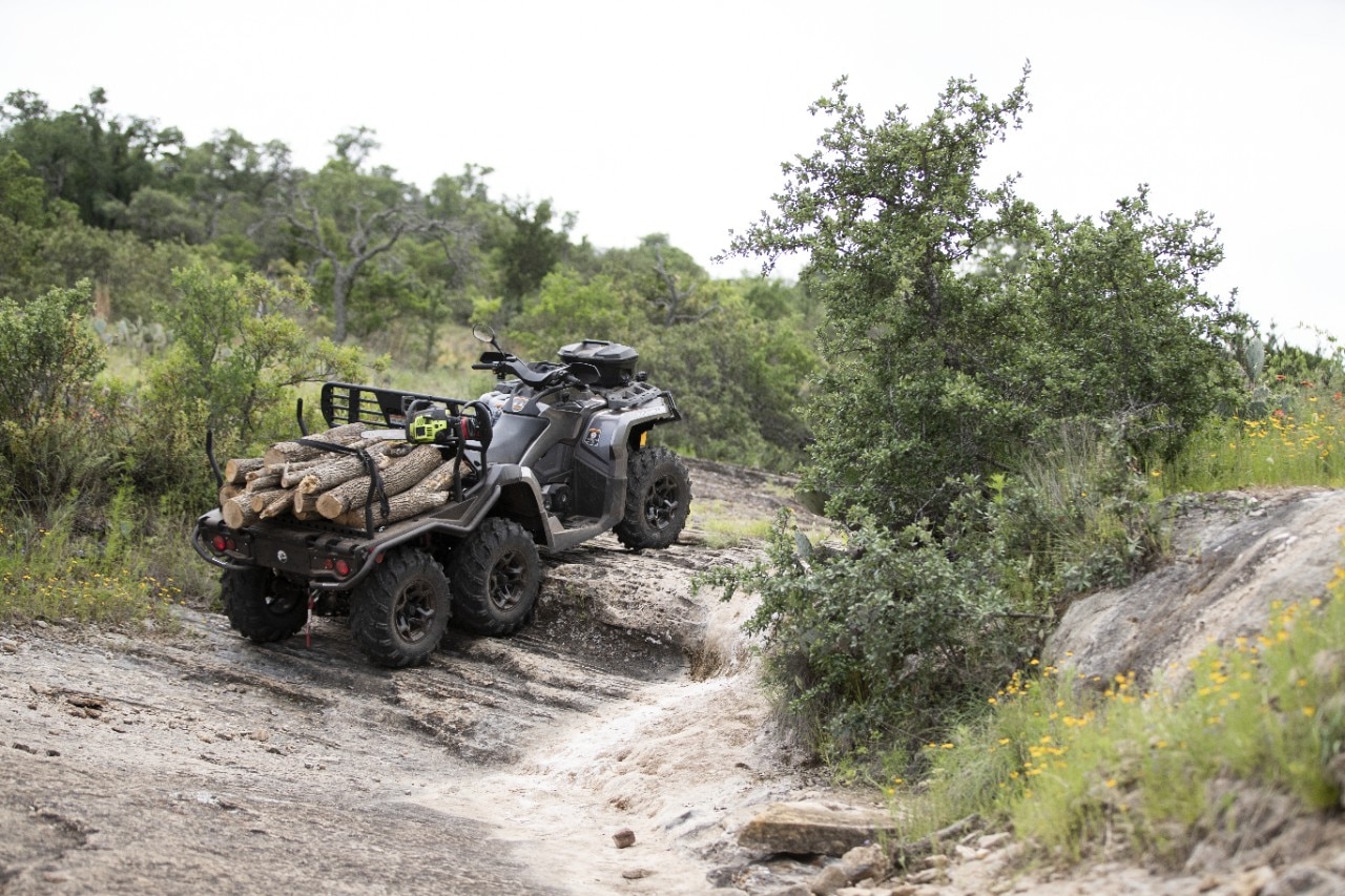 Can-Am Outlander 6x6 standing on rock