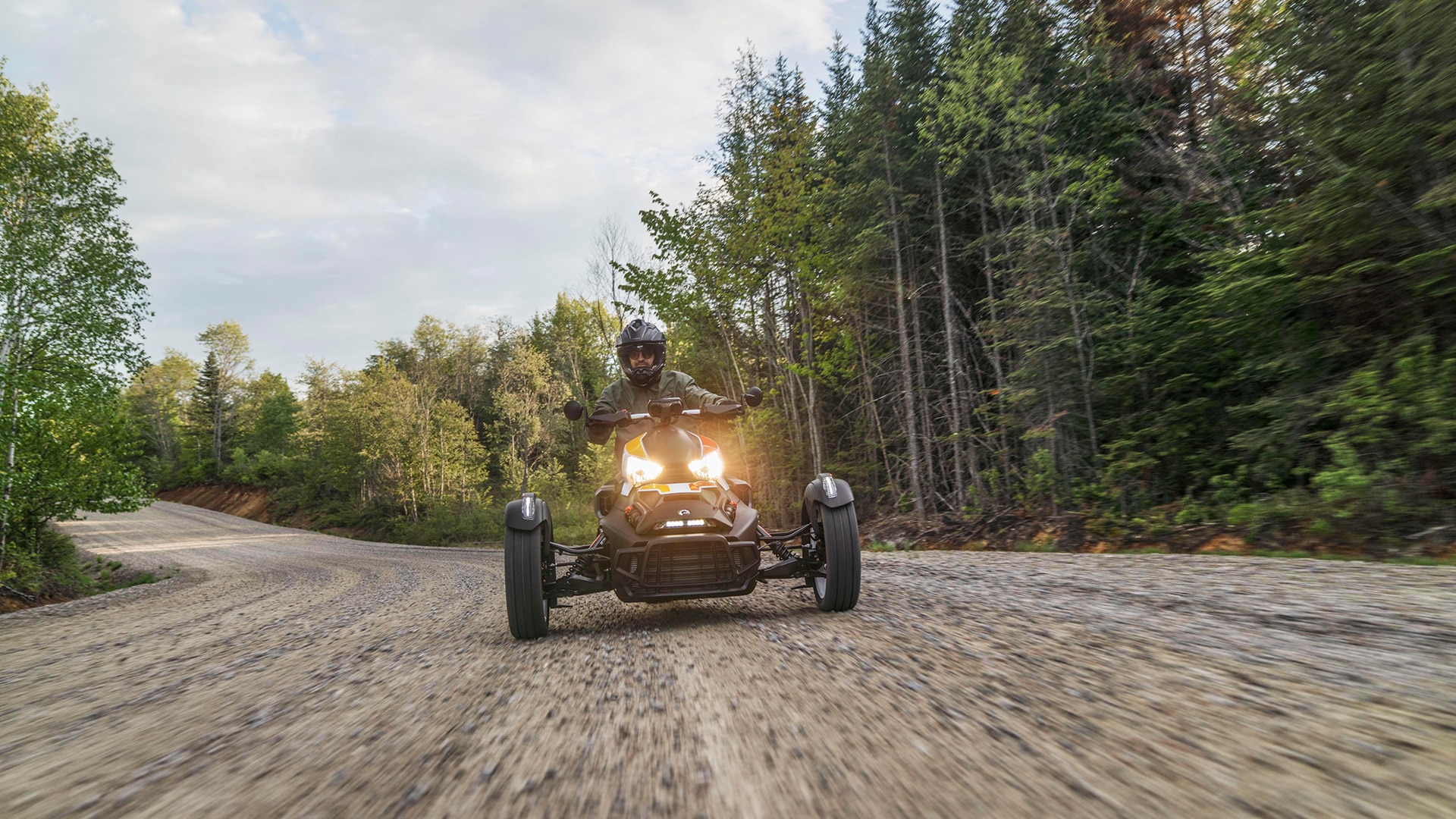 Front view of a Can-Am Ryker Rally on dirt road