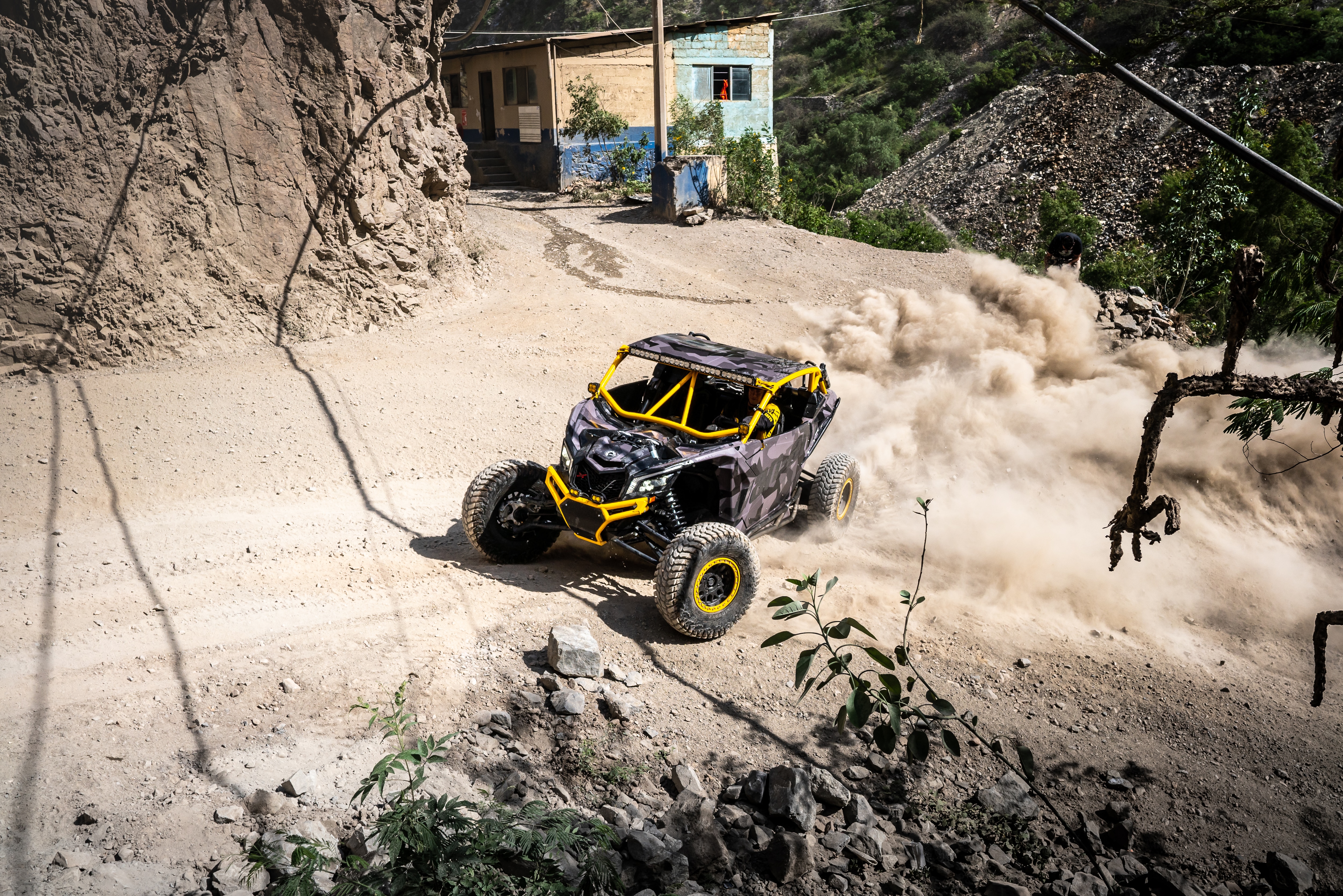 Can-Am Maverick X3 trowing dust during the Dakar Rally