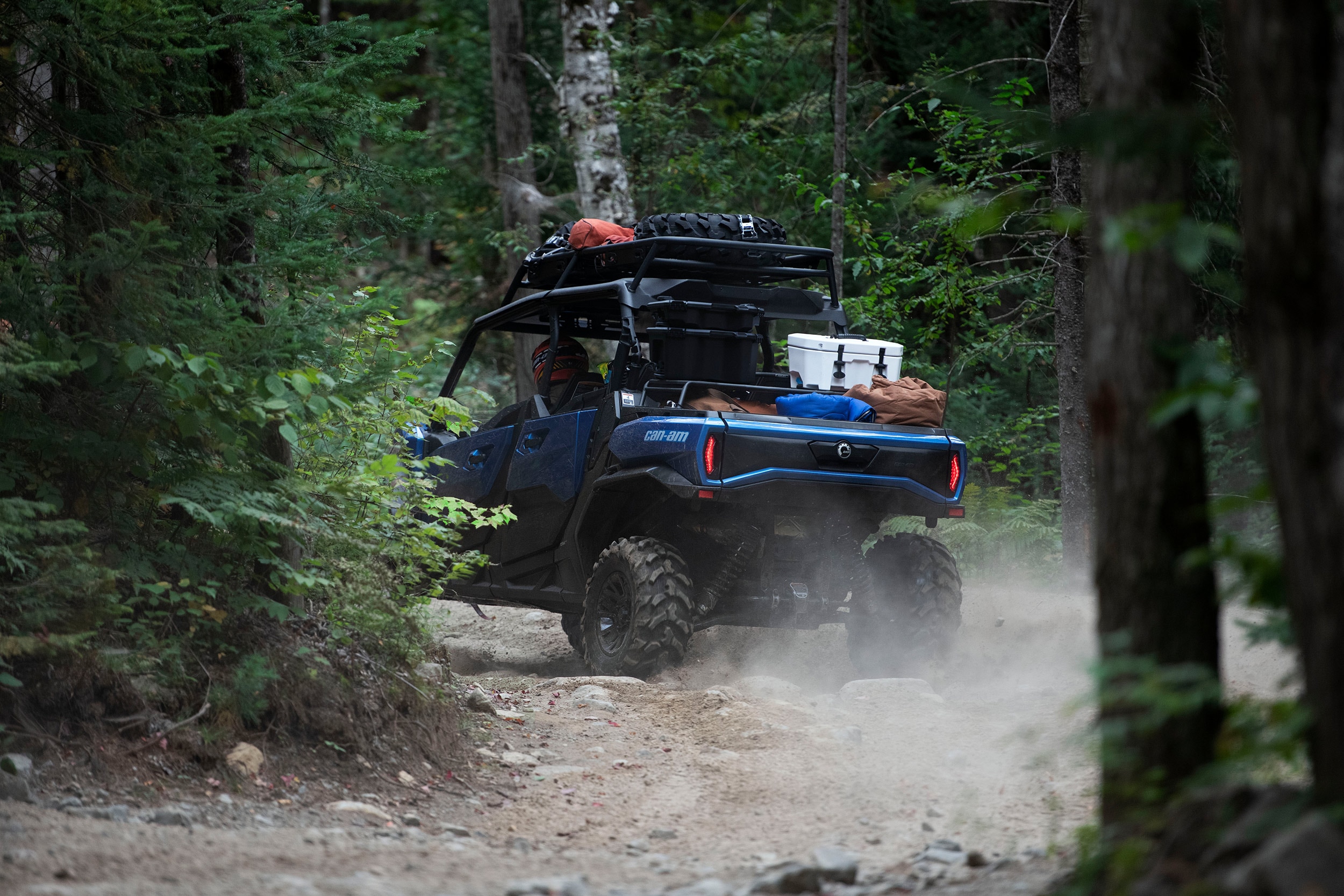 A Can-Am Off-Road vehicle on a trail