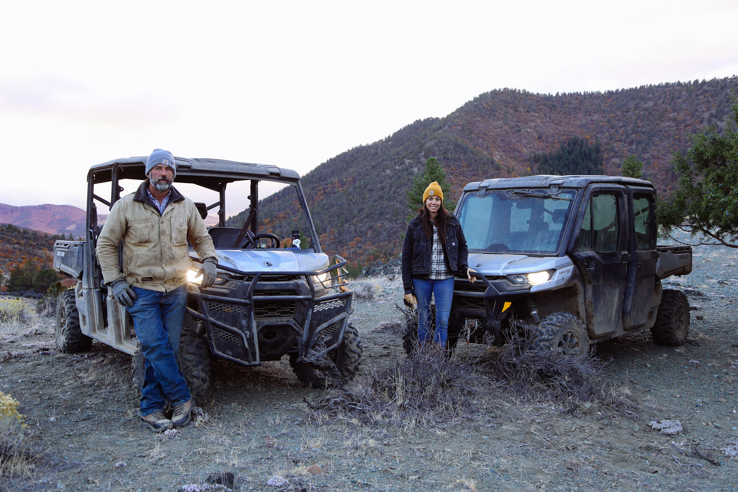 Mary Heffernan and her husband with their two Can-Am Defender side-by-sides