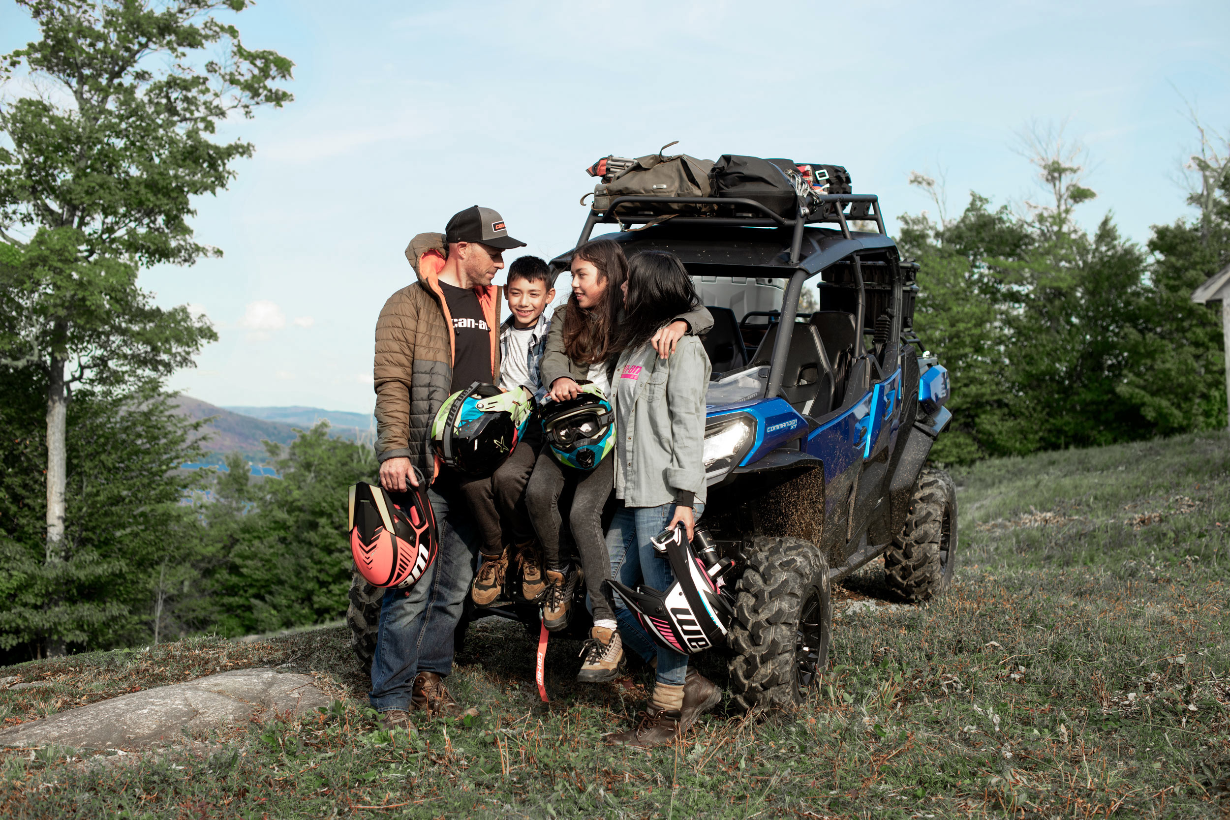 A family with their Can-Am vehicle