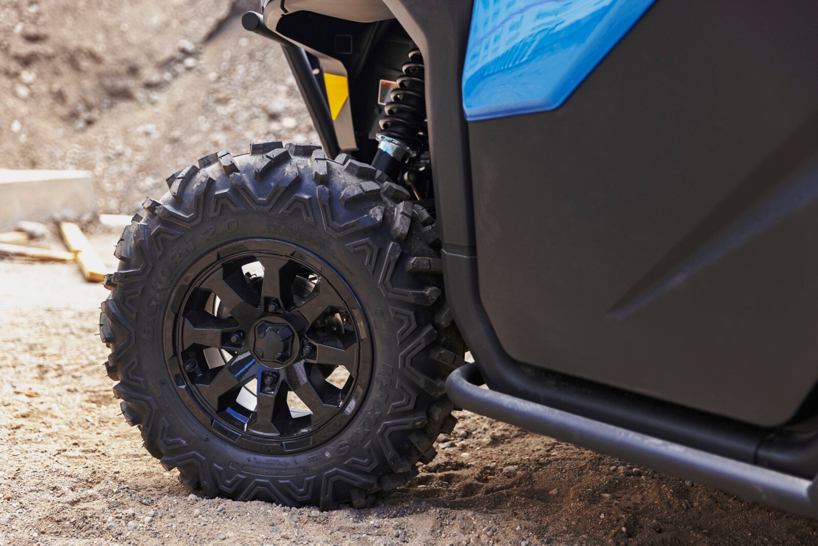Close-up of a wheel turning, showing suspension of a Can-Am Defender 6X6 Limited