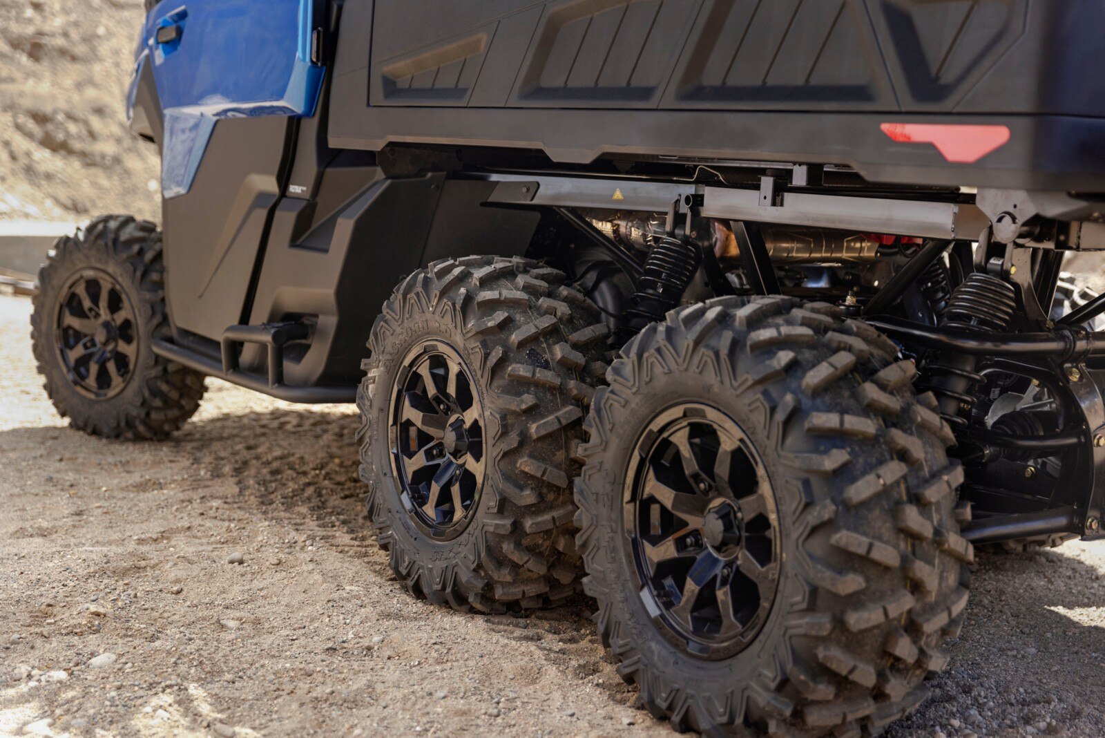 Shot of the bottom of the driver's side of a Defender 6x6 Limited showing off the wheels 