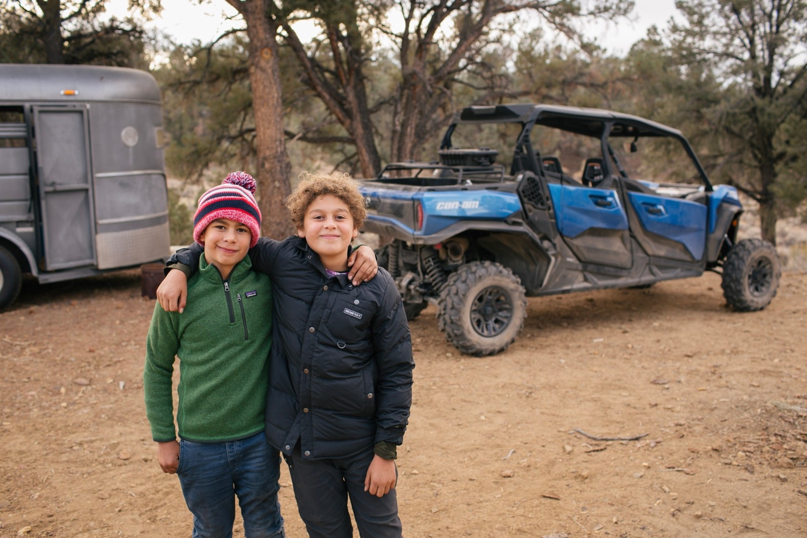 Billy Parks' two young boys posing together in front of their Oxford Blue Can-Am Commander MAX XT