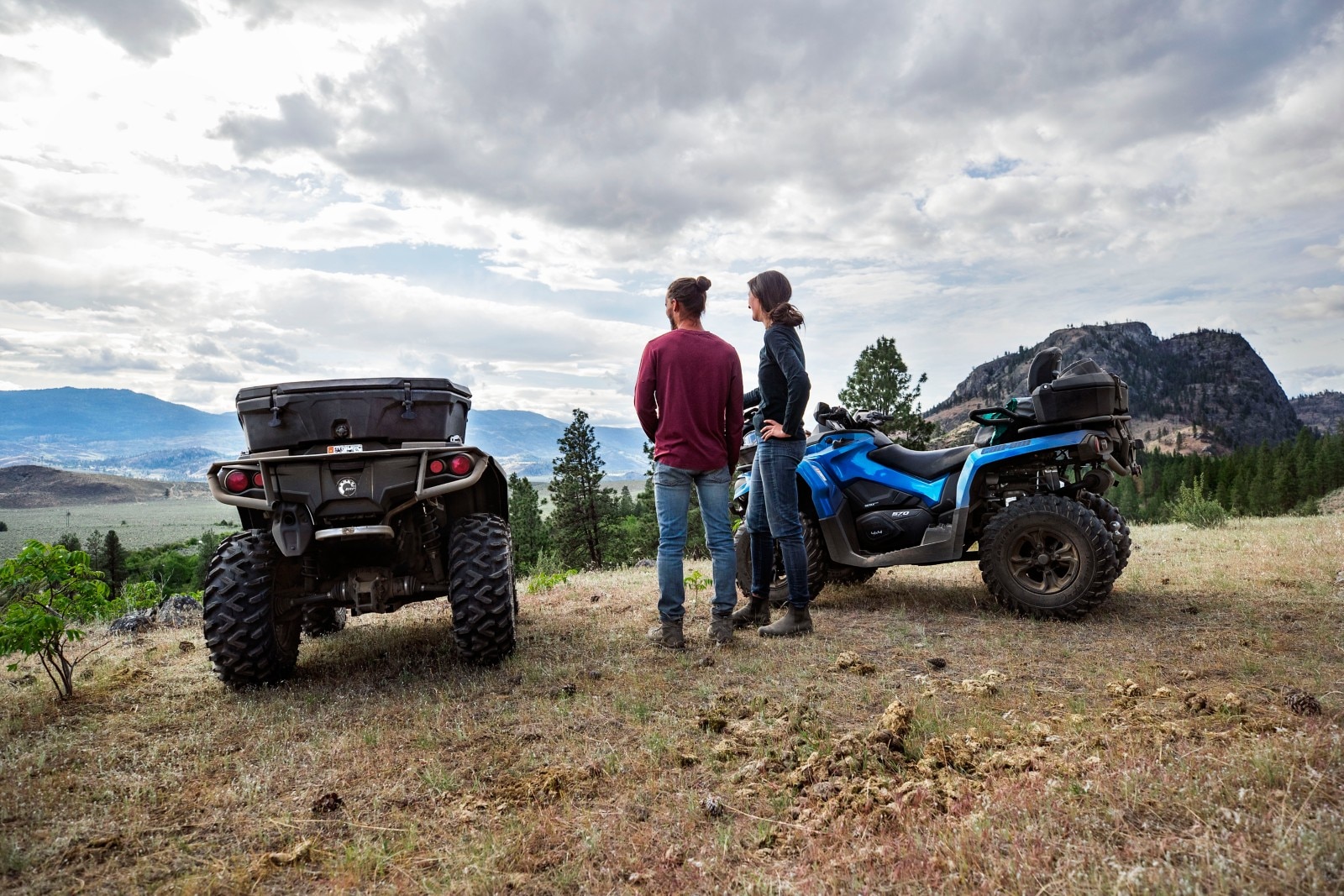 Two Can-Am riders watching the view 