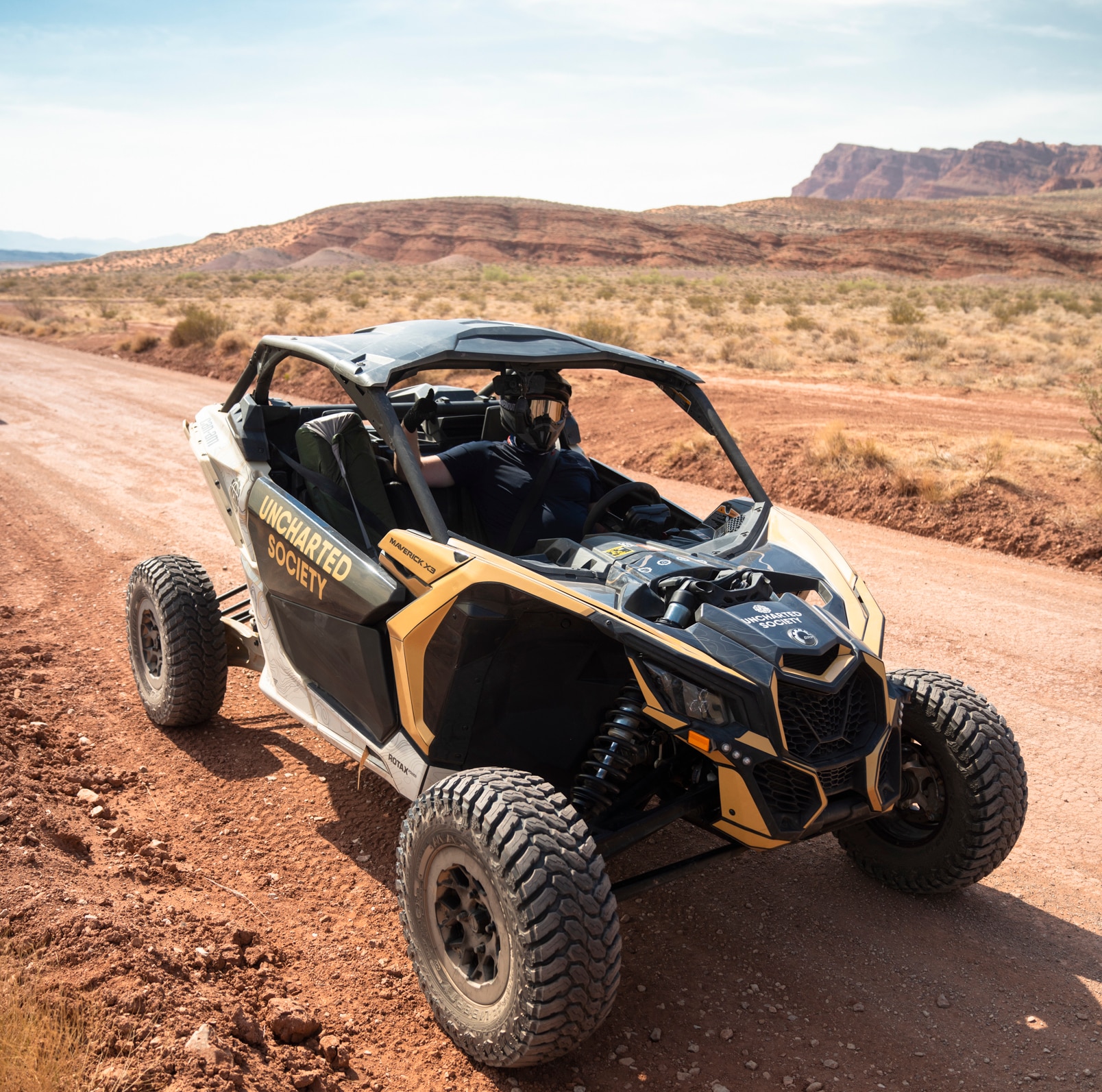 Uncharted Society branded Maverick-X3 Off-Road Side-by-Side vehicle
