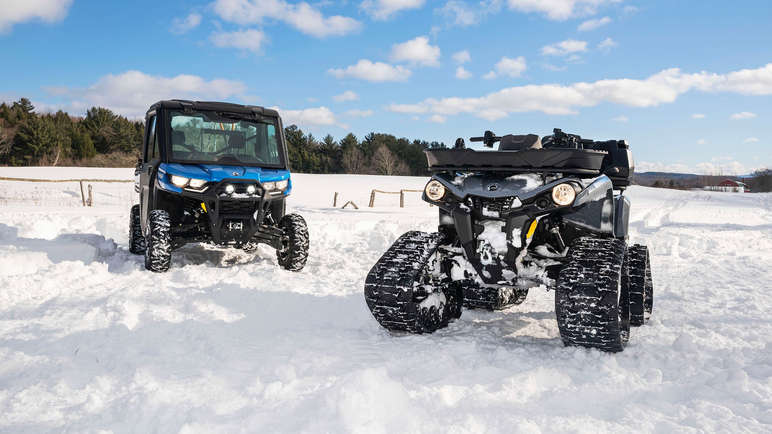 Full view of two Can-Am vehicles outside